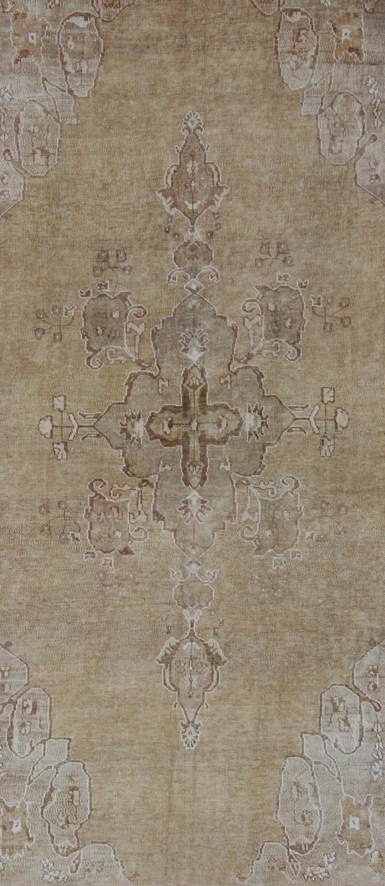 Vintage Turkish Kars Gallery Rug With Earthy Color Palette and Ivory Border Turkish rug from Kars Area with Medallion design, rug en - 92120, country of origin / type: Turkey / Kars, circa 1940 This beautiful vintage Turkish carpet is highly d... - Keivan Woven ArtsEN - 92120 - 2396Rug