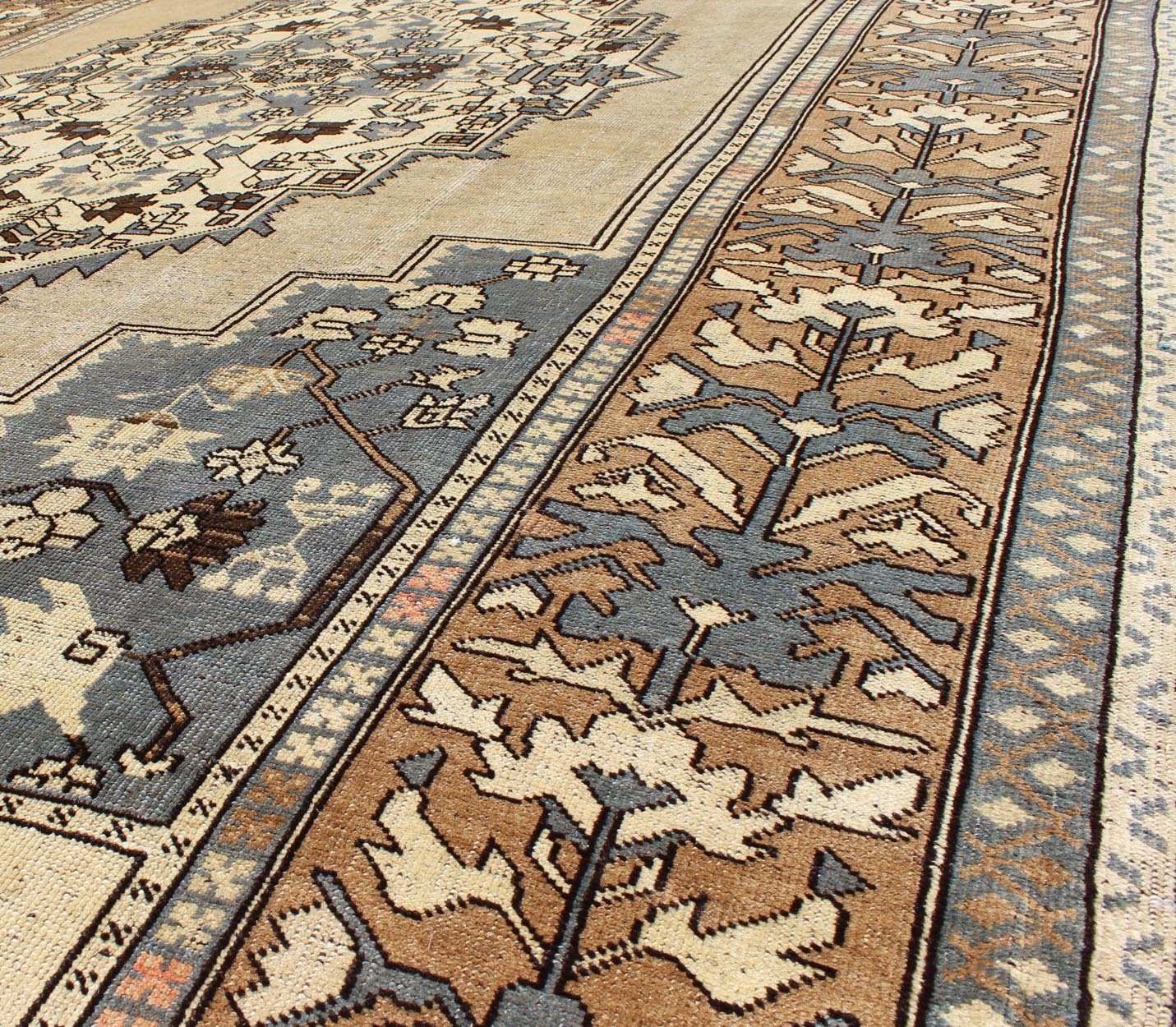 Vintage Turkish Medallion Oushak Rug in Rustic Blue, Mocha, and Taupe Measures: 7'2 x 12'9 Unique in its color palette and composition, this vintage Oushak features large - scale motifs and a central medallion. The field design is rendered... - Keivan Woven ArtsEN - 94123 - 3814Rug