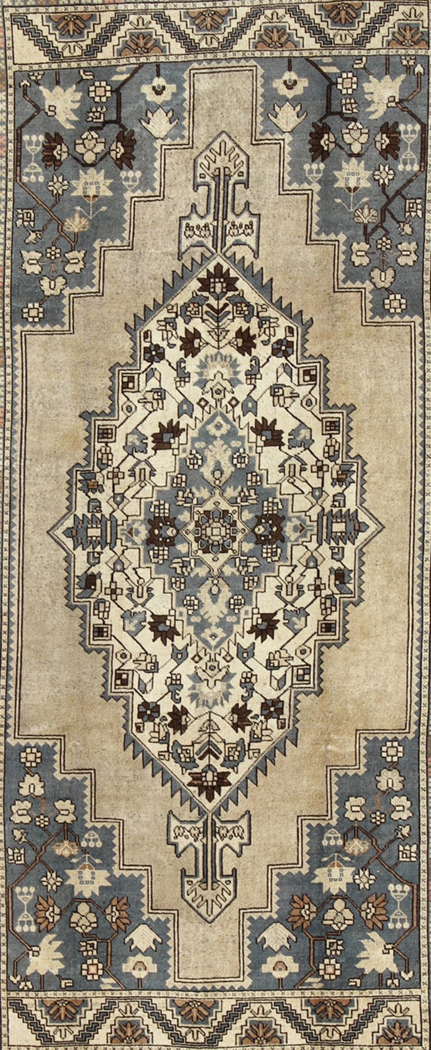Vintage Turkish Medallion Oushak Rug in Rustic Blue, Mocha, and Taupe Measures: 7'2 x 12'9 Unique in its color palette and composition, this vintage Oushak features large - scale motifs and a central medallion. The field design is rendered... - Keivan Woven ArtsEN - 94123 - 3814Rug