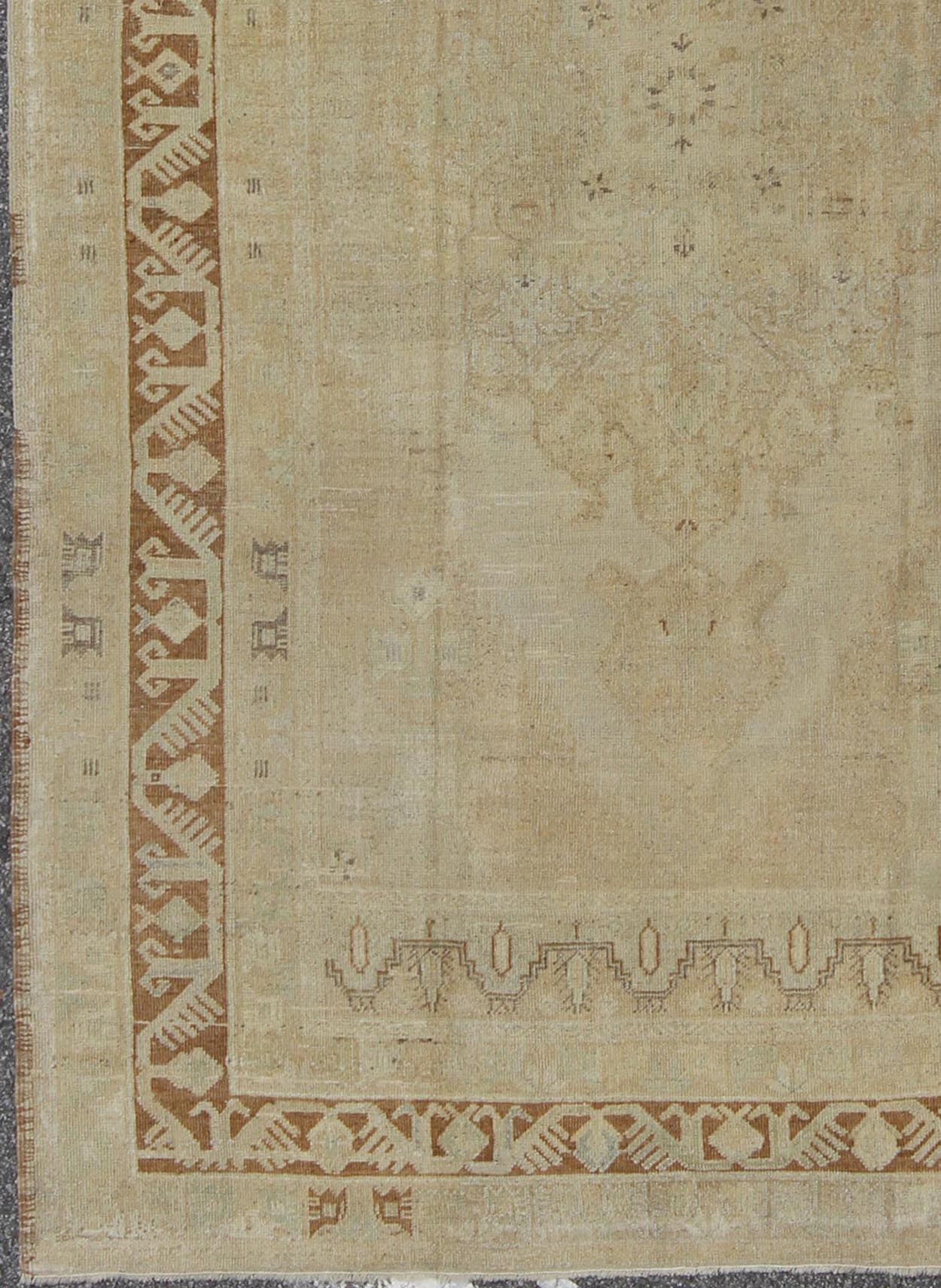 Vintage Turkish Diamond Medallion Oushak in Neutral Earth Tones Measures: 5'8 x 9'1 Characterized by a comely and highly representative Oushak composition, this vintage Oushak carpet beautifully communicates the finer strength of Oushak r... - Keivan Woven ArtsEN - 946 - 7821Rug