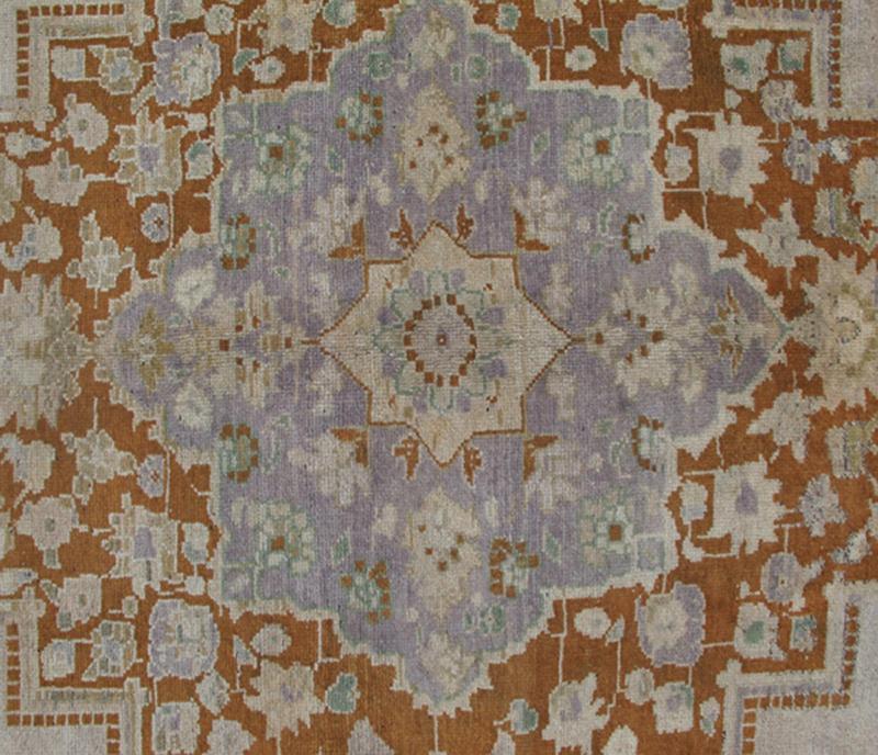 Vintage Turkish Oushak Rug in Brown, Pale Green, Taupe & Taupe Light Purple Measures 6'10 x 10'5 This softly colored Oushak carpet rests beautifully upon a field of elegant light taupe. A large medallion of lavender/gray and saddle brow... - Keivan Woven ArtsEN - 989 - 5265Rug