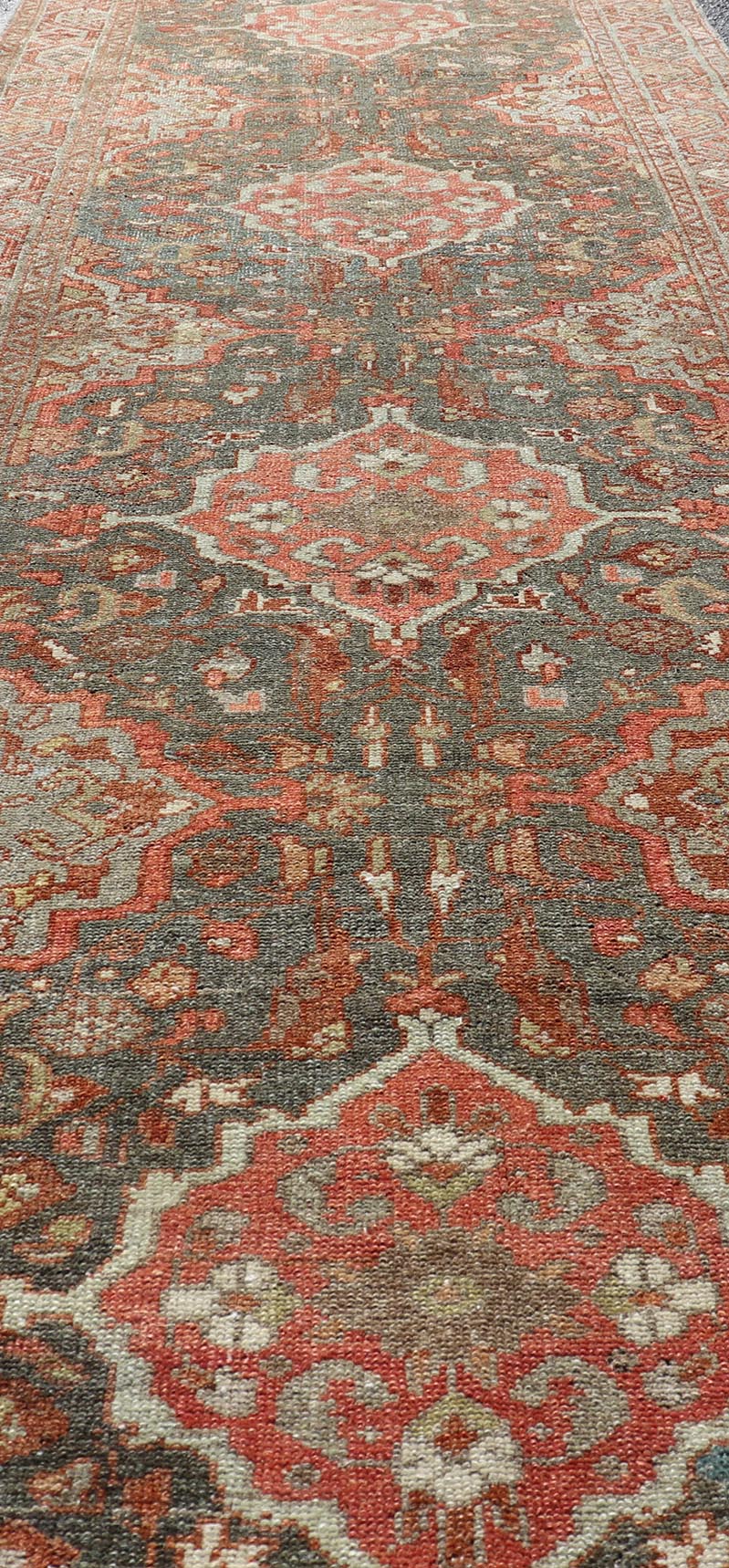 Antique Persian Malayer Runner with All - Over Floral Medallions Design Measures: 2'10 x 9'6 This Persian Malayer features stylized floral medallions contrasting bold colors with dark charcoal and bright red - orange, as well as soft light g... - Keivan Woven ArtsEN - P13902 - 18716Rug