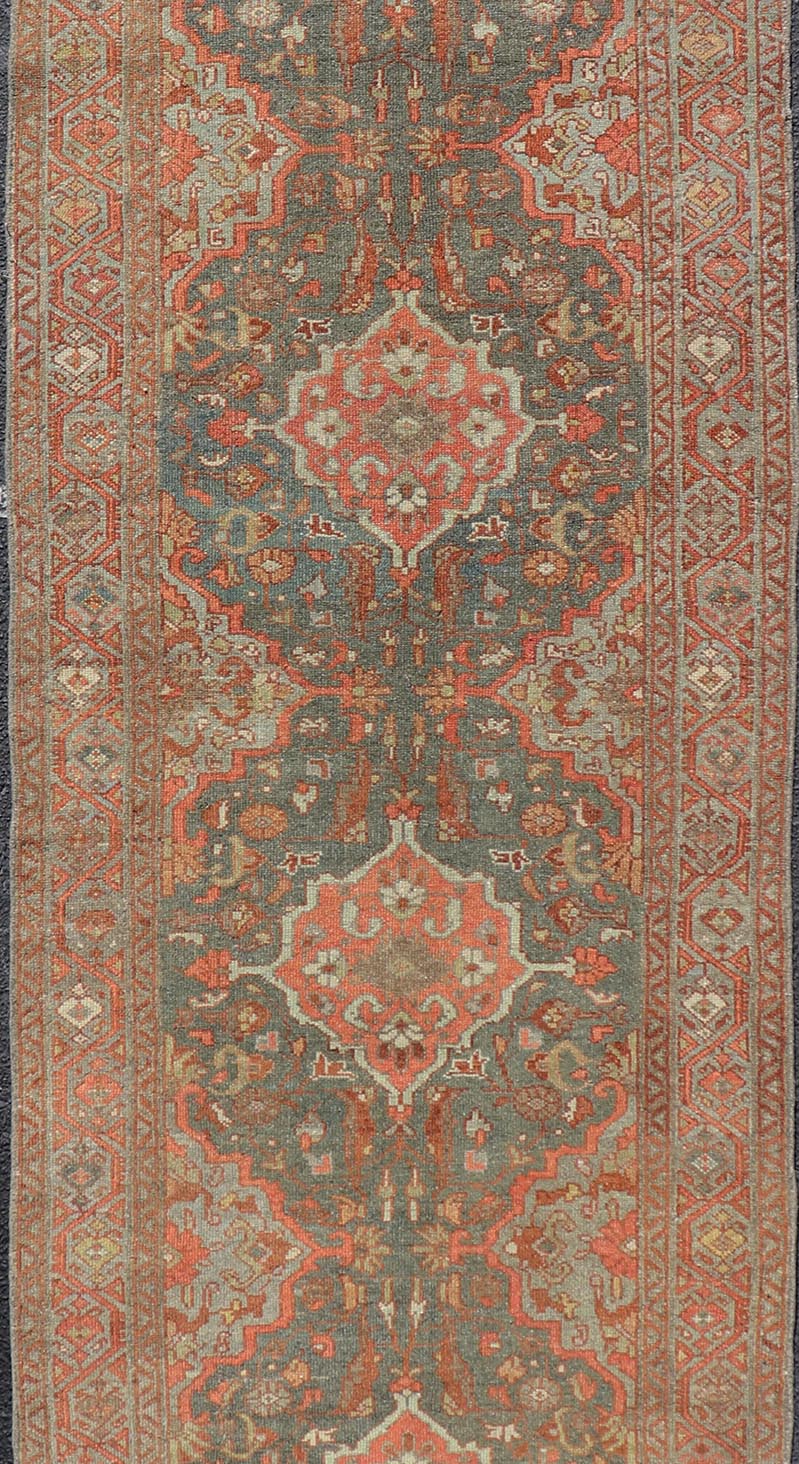 Antique Persian Malayer Runner with All - Over Floral Medallions Design Measures: 2'10 x 9'6 This Persian Malayer features stylized floral medallions contrasting bold colors with dark charcoal and bright red - orange, as well as soft light g... - Keivan Woven ArtsEN - P13902 - 18716Rug