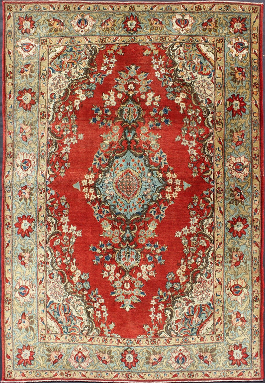 Fine Persian Qum Carpet with Red, Light Blue, Light Green, Navy and Brown This beautiful vintage Persian Qum rug bears a stretched central Medallion of blue with an impressive array of flora surrounding its body. The red field plays host to a de... - Keivan Woven ArtsF - 0701 - 1054