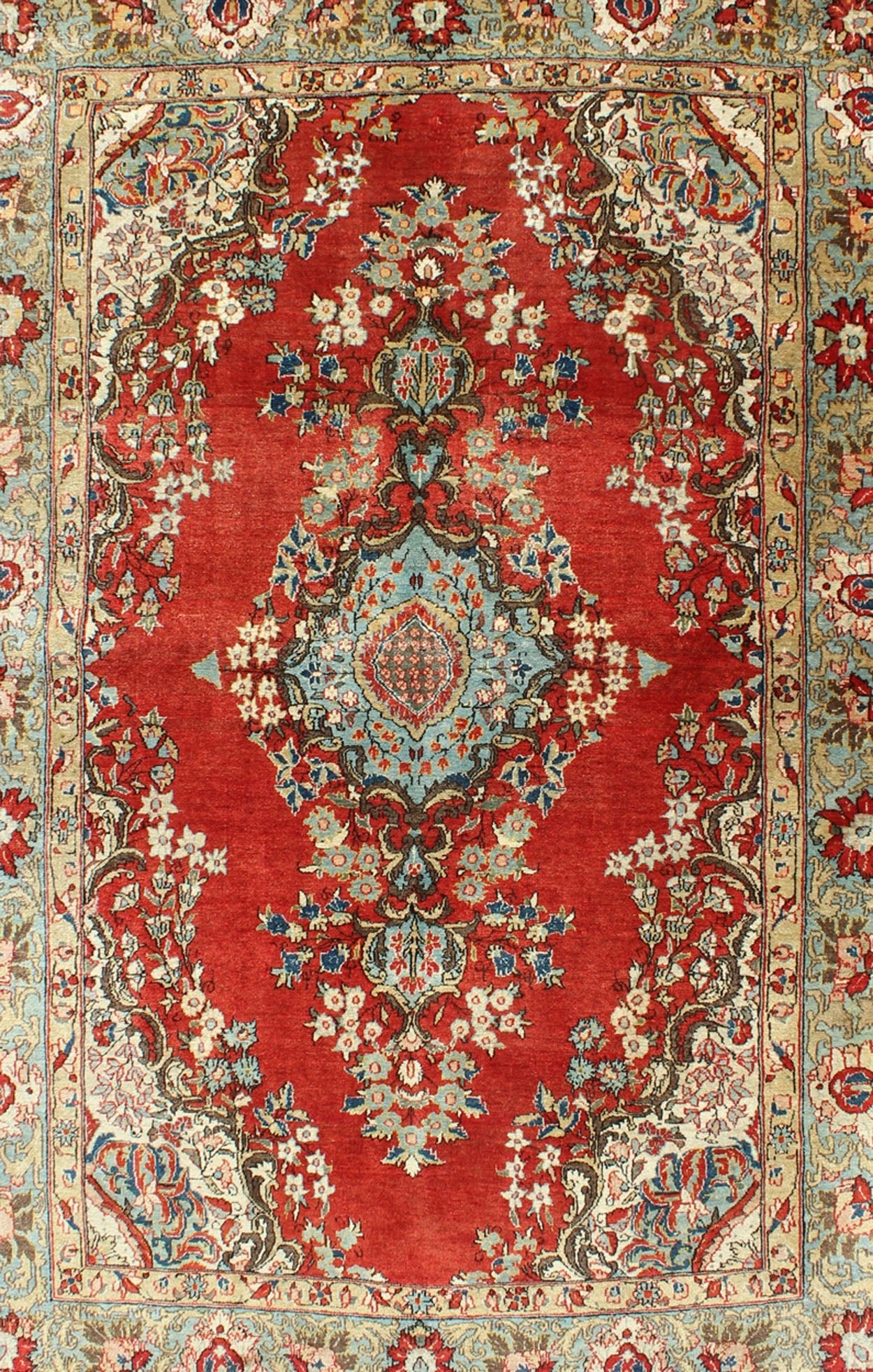 Fine Persian Qum Carpet with Red, Light Blue, Light Green, Navy and Brown This beautiful vintage Persian Qum rug bears a stretched central Medallion of blue with an impressive array of flora surrounding its body. The red field plays host to a de... - Keivan Woven ArtsF - 0701 - 1054Rug