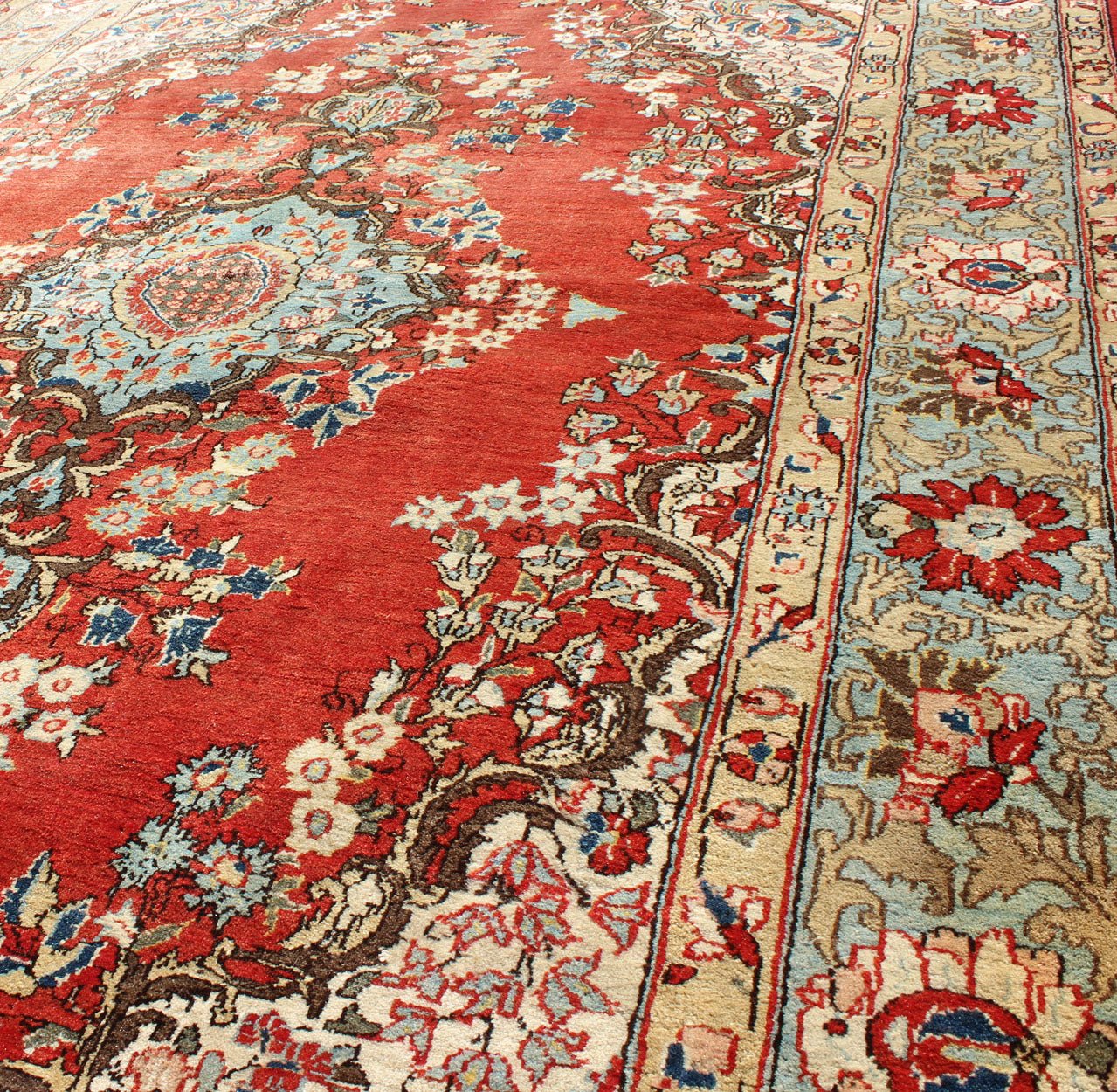 Fine Persian Qum Carpet with Red, Light Blue, Light Green, Navy and Brown This beautiful vintage Persian Qum rug bears a stretched central Medallion of blue with an impressive array of flora surrounding its body. The red field plays host to a de... - Keivan Woven ArtsF - 0701 - 1054Rug