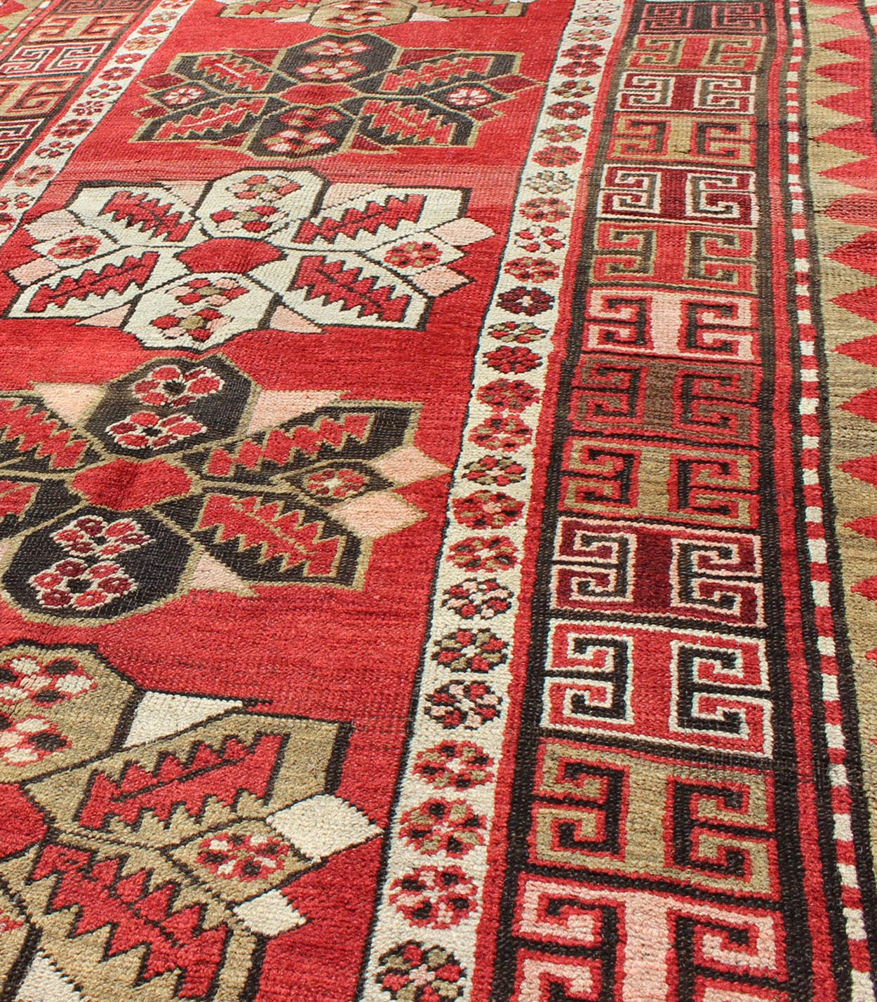 Red background antique Kazak runner with medallions and tribal design, Keivan Woven Arts / rug g - 1204, country of origin / type: Caucasus / Kazak, circa 1900 The field design of this antique Kazak runner features medallions of differing colors s... - Keivan Woven ArtsG - 1204 - 2271Rug