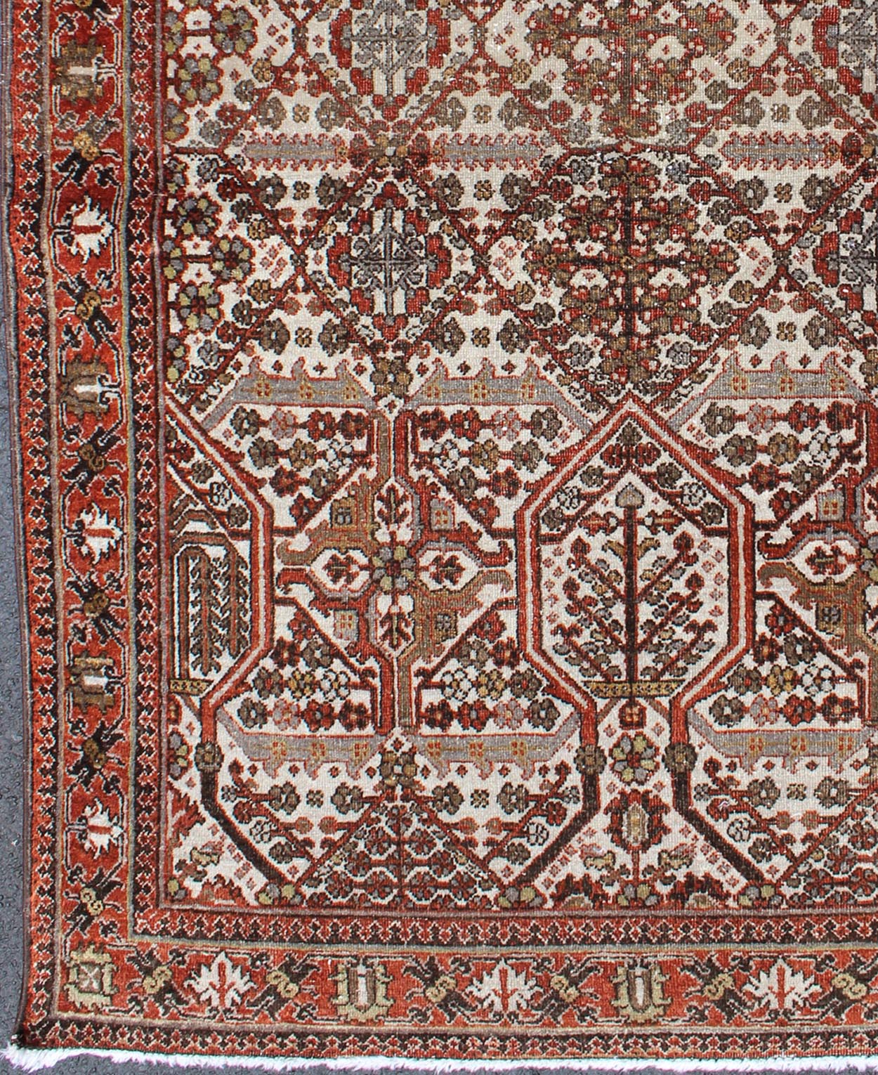 Antique Persian Joshegan Rug in Ivory Background with Red, Green and Blue This antique Joshegan rug from 1920s Iran was handwoven and bears a remarkably unique all - over interconnected Sub - geometric design, consisting mostly of diamond shapes and re... - Keivan Woven ArtsGNG - 4741 - 9898Rug