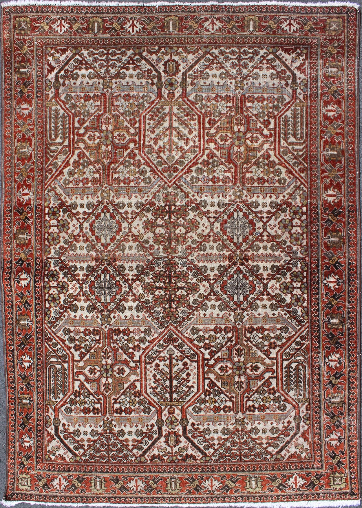 Antique Persian Joshegan Rug in Ivory Background with Red, Green and Blue This antique Joshegan rug from 1920s Iran was handwoven and bears a remarkably unique all - over interconnected Sub - geometric design, consisting mostly of diamond shapes and re... - Keivan Woven ArtsGNG - 4741 - 9898Rug