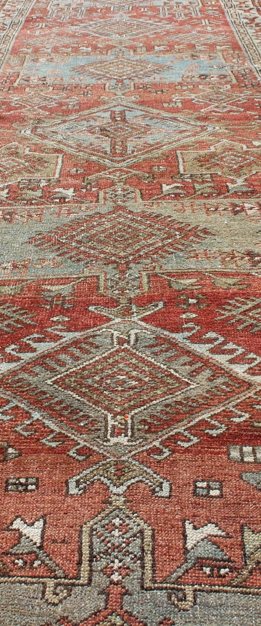 Sub - geometric Medallion design Persian Heriz antique runner in red and gray - blue tones, rug gng - 4750, country of origin / type: Iran / Heriz, circa 1920 This antique Persian Heriz runner, from northwest Iran, displays a geometric medallion desig... - Keivan Woven ArtsGNG - 4750 - 9918Rug