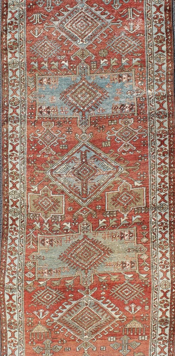 Sub - geometric Medallion design Persian Heriz antique runner in red and gray - blue tones, rug gng - 4750, country of origin / type: Iran / Heriz, circa 1920 This antique Persian Heriz runner, from northwest Iran, displays a geometric medallion desig... - Keivan Woven ArtsGNG - 4750 - 9918Rug