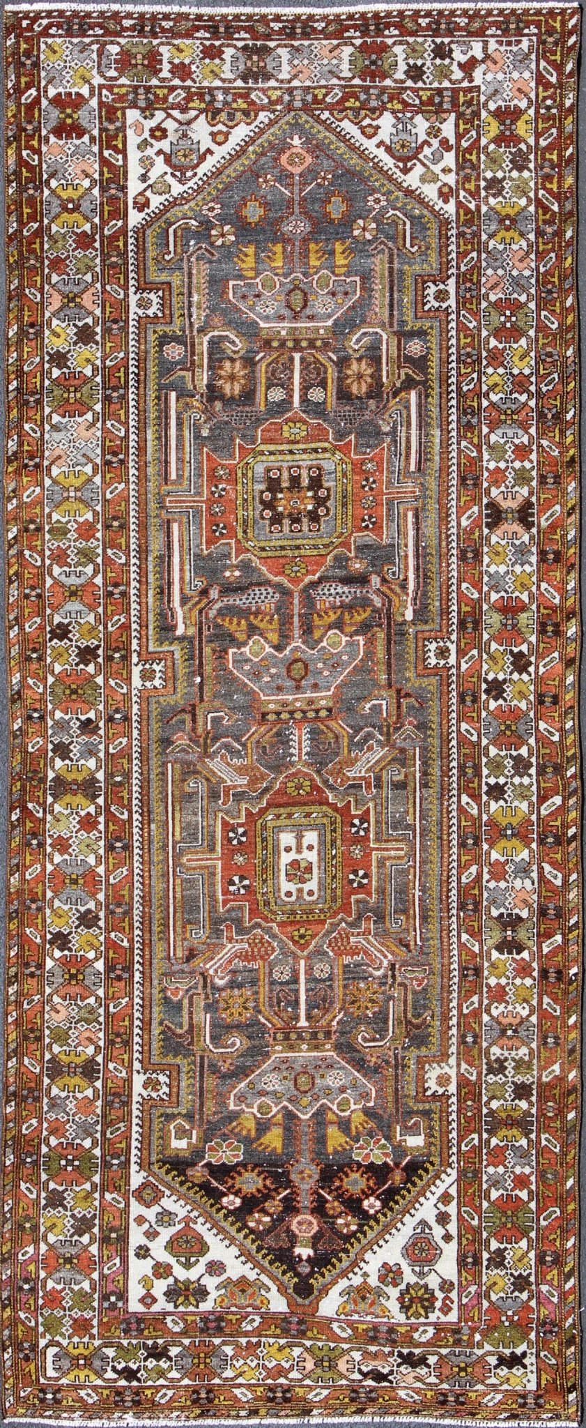Geometric Medallion Design Vintage Persian Bakhtiari Runner in Orange, Olive, Brown, Ivory, and Gray, rug gng - 4753, country of origin / type: Iran / Bakhtiari, circa 1930 Persian Bakhtiari rugs are in fact tribal pieces that rely upon a repertoi... - Keivan Woven ArtsGNG - 4753 - 9926Rug