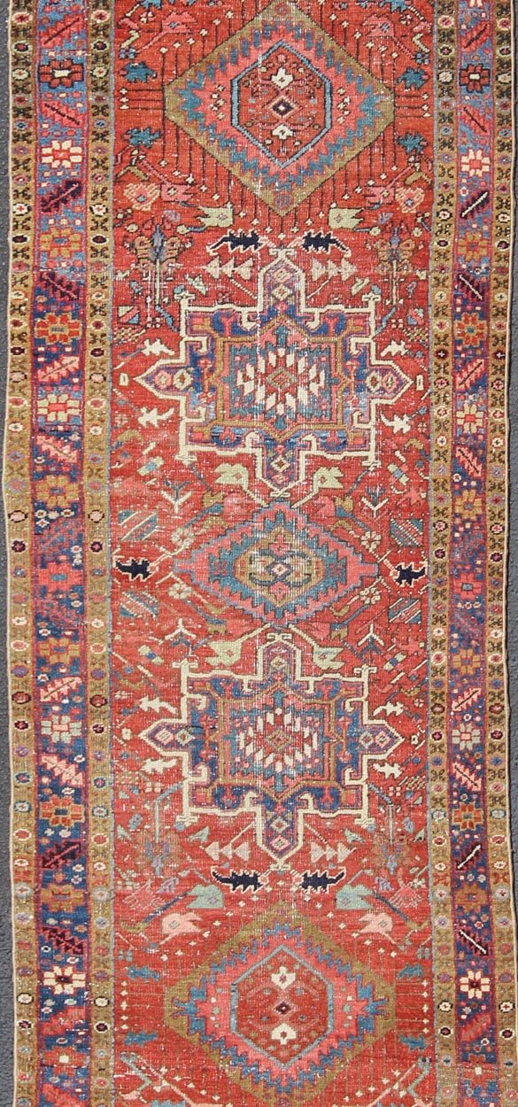 Sub - Geometric Medallion Antique Persian Heriz Runner in Red and Blue Heriz Persian antique rug with sub - geometric motifs and six medallions in colorful Tones, Keivan Woven Arts / rug gng - 4770, country of origin / type: Iran / Heriz, circa 1920 ... - Keivan Woven ArtsGNG - 4770 - 9954Rug