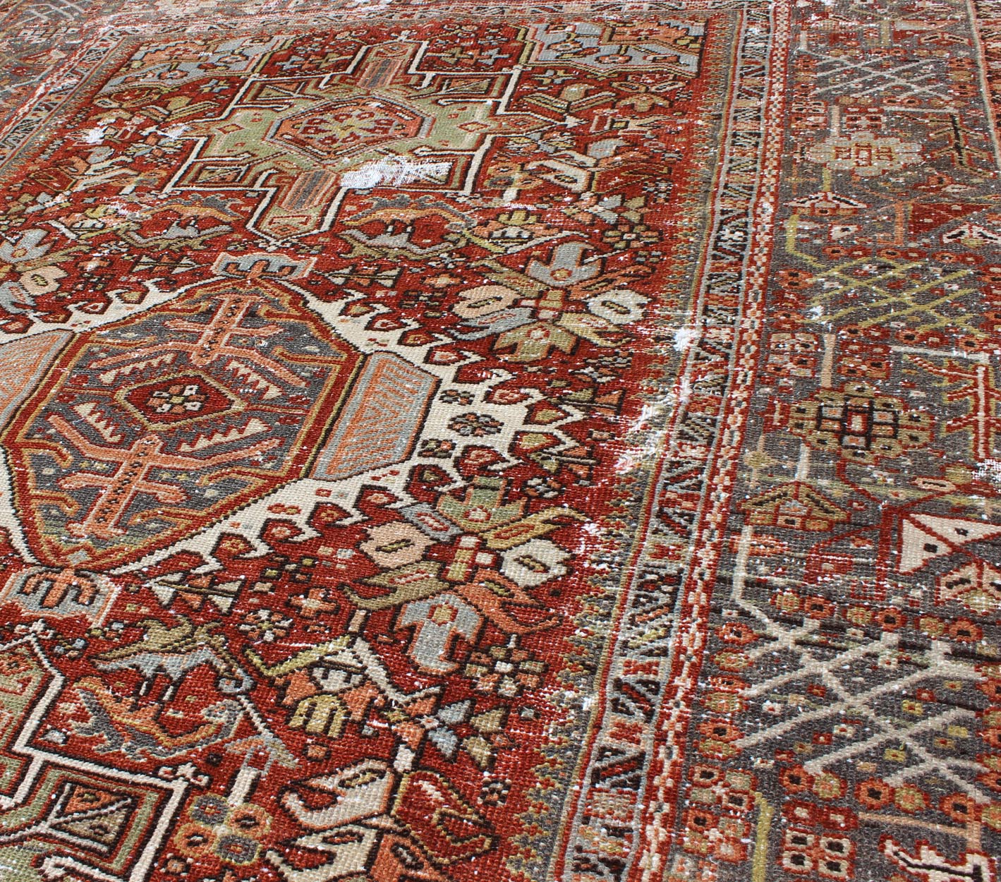 Keivan Woven Arts, Gng - 4771, 1920s Distressed Heriz Tribal. Antique Persian distressed Heriz rug with three medallion Geometric Tribal design, rug GNG - 4771, country of origin / type: Iran / Heriz, circa 1920. This early 20th century, handwoven a... - Keivan Woven ArtsGNG - 4771 - 9960Rug