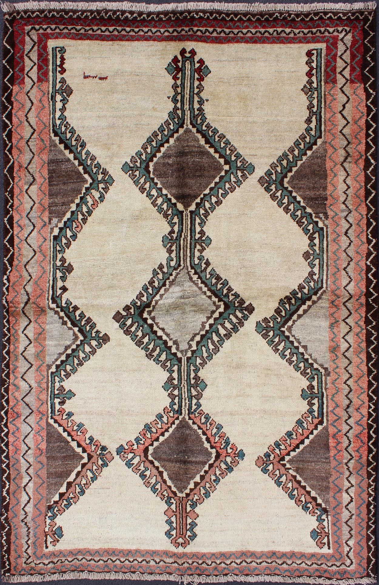 Keivan Woven Arts, H - 1205 - 06, 1950s Semi Antique Gabbeh Rug This Semi Antique Gabbeh carpet features a geometric design, including a repeating diamond design in its central field. Multiple tribal - patterned borders surround the field and frame entire... - Keivan Woven ArtsH - 1205 - 06 - 4148Rug