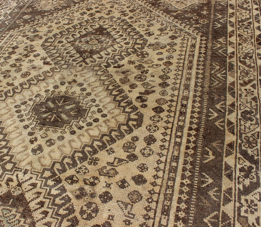 Keivan Woven Arts, H - 1211 - 40, 1950s Semi - Antique Rug Vintage Persian Shiraz with Tribal Design and Neutral Colors This vintage Persian rug features a central medallion design in a neutral color palette with brown outlines. The geometric,... - Keivan Woven ArtsH - 1211 - 40 - 3774