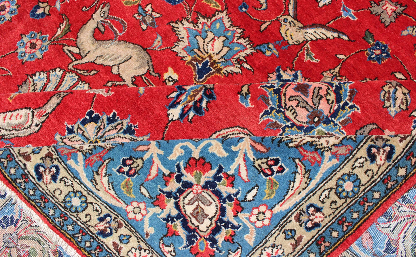 Vintage fine Persian Isfahan rug with all - over floral design, red background and Blue Border, rug h - 404 - 05, country of origin / type: Iran / Isfahan, circa 1950. This outstanding midcentury Persian Isfahan carpet is primarily characterized by it... - Keivan Woven ArtsH - 404 - 05 - 2171Rug