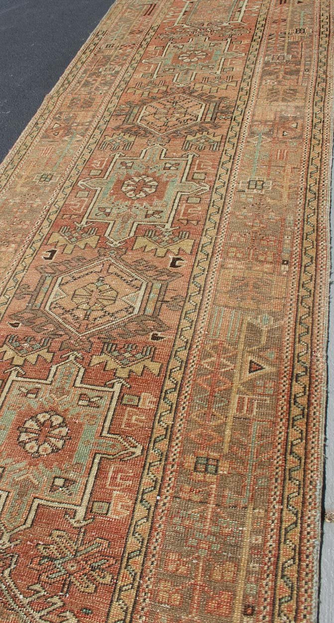 Soft Red or Salmon, Long Persian Heriz Runner with Geometric Medallions kwarugs Multi - Medallion Persian Runner in Geometric Design, rug h - 504 - 09, country of origin / type: Iran / Heriz, circa 1950 This vintage Persian Heriz runner feature... - Keivan Woven ArtsH - 504 - 09 - 10279Rug
