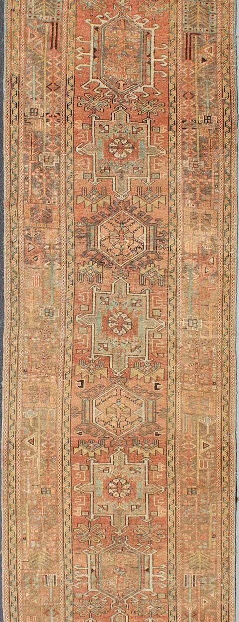 Soft Red or Salmon, Long Persian Heriz Runner with Geometric Medallions kwarugs Multi - Medallion Persian Runner in Geometric Design, rug h - 504 - 09, country of origin / type: Iran / Heriz, circa 1950 This vintage Persian Heriz runner feature... - Keivan Woven ArtsH - 504 - 09 - 10279Rug