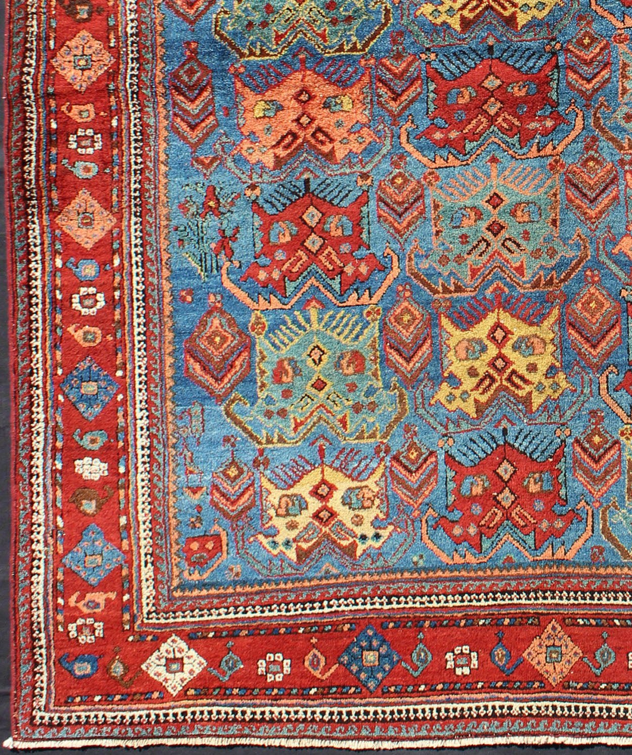 Square shape Antique Persian Afshar Rug in Blue Background, Terracotta Red Border, Light Green, vivid yellow, salmon and ivory. Bold geometry, rich symbolism, and vivid singular coloration contribute to the beauty of this stunning piece. Keivan Woven A... - Keivan Woven ArtsH8 - 1103 - 1568Rug