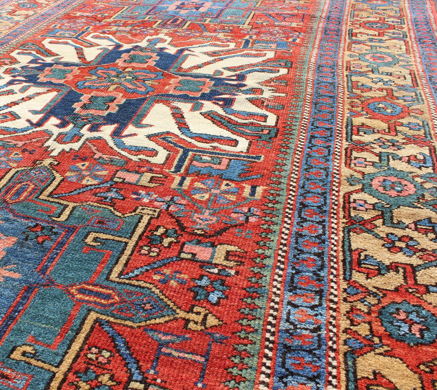 Antique Persian Karajeh - Serapi with Tribal Design Measures: 4'7'' x 6'10''. Established with luxurious jewel tones, this finely woven antique Serapi - Karajeh carpet from Persia is a striking piece. It is engagingly accented with a brilliant ta... - Keivan Woven ArtsI - 0501 - 2639Rug