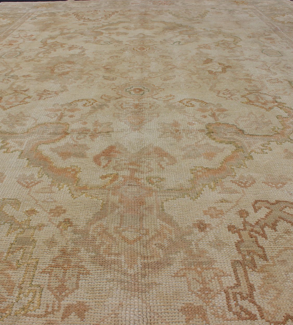 Antique Turkish Hand Knotted Oushak Rug in Taupe, Beige, Green and Copper Antique Oushak rug in taupe, beige, green copper, peach, muted brown, Keivan Woven Arts / rug / I - 1003. Antique Oushak rug Measures: 8'3 x 12'10. This antiqu... - Keivan Woven ArtsI - 1003 - 1857Rug