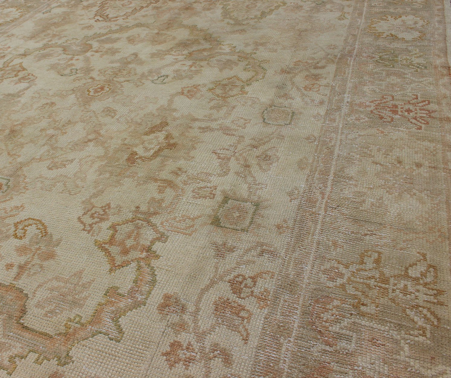 Antique Turkish Hand Knotted Oushak Rug in Taupe, Beige, Green and Copper Antique Oushak rug in taupe, beige, green copper, peach, muted brown, Keivan Woven Arts / rug / I - 1003. Antique Oushak rug Measures: 8'3 x 12'10. This antiqu... - Keivan Woven ArtsI - 1003 - 1857Rug
