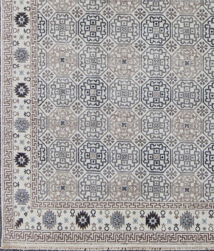 Vintage Afghan Khotan Rug. Measures: 8'2 X 10'3. This Gorgeous Vintage Afghan Khotan Rug features an all - over repeating geometric design with and exquisite border. The blend of natural colors in shades of brown, grey and pastels give this rug a w... - Keivan Woven ArtsIN - BAM - 59078 - 8289Rug