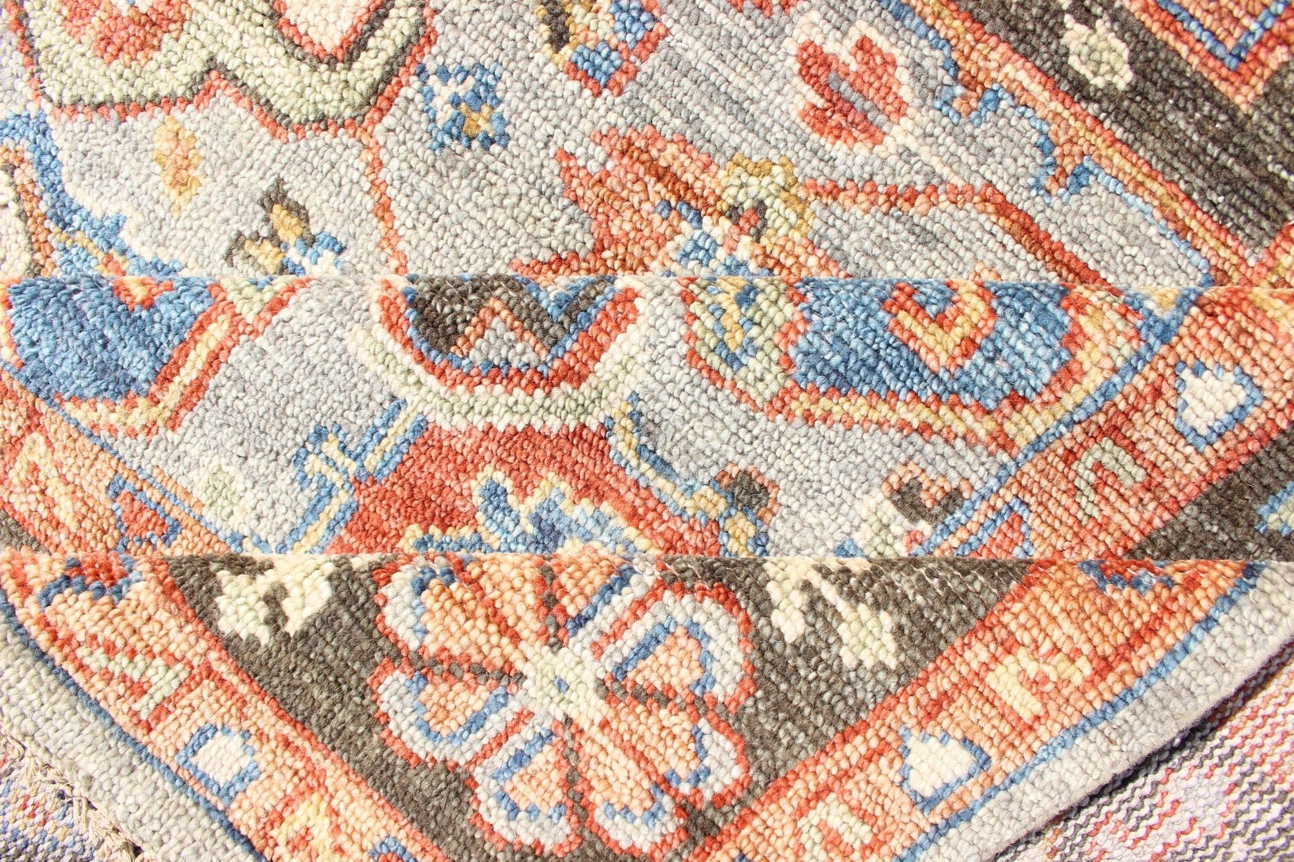 Indian Hand - Knotted Medallion Heriz in Cocoa, Denim, and Red Measures 8'6 x 11'10 Country of Origin: India; Type: Heriz; Design; Floral Border, Floral Medallion, Diamond Medallion; Keivan Woven Arts: rug IN - CPL - DM294; Indian Hand - Knotted... - Keivan Woven ArtsIN - CPL - DM294 - 13450Rug