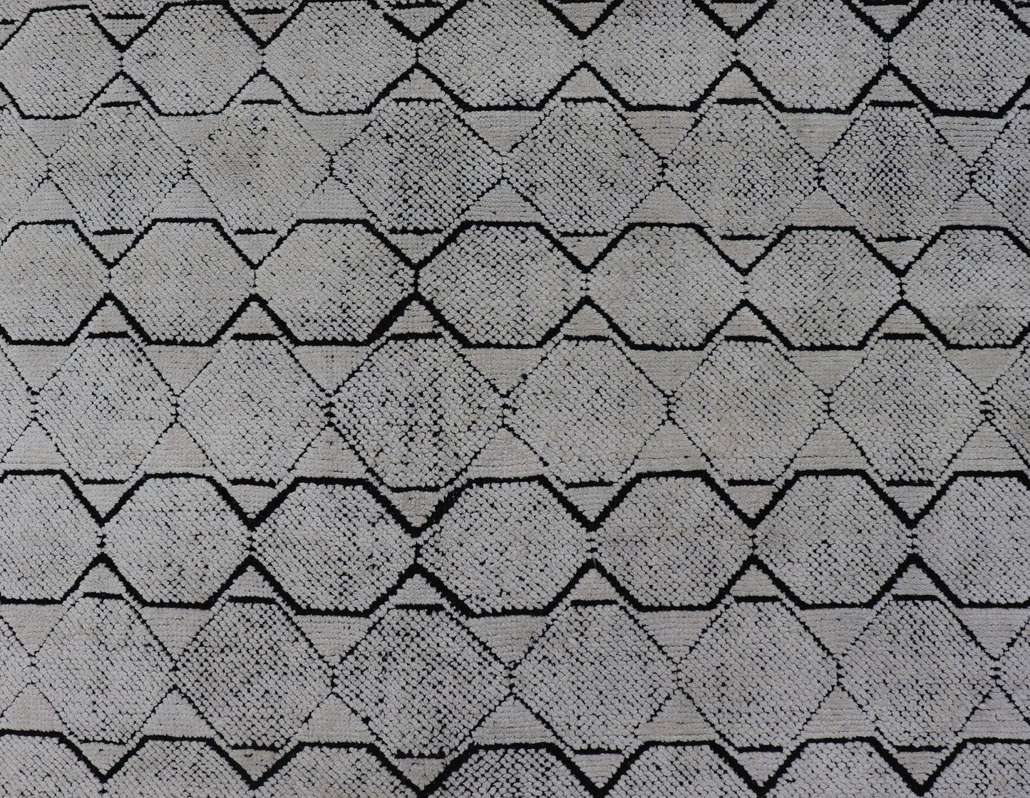 Indian Modern Geometric & Minimal Design Area Rug in Ivory and Black Measures 6'1 x 9'2 The design is a minimalistic, repeating pattern of octagons and triangles in black and ivory paneling the entire face horizontally. With a less - is - m... - Keivan Woven ArtsIN - ILM - 162 - 20988Rug