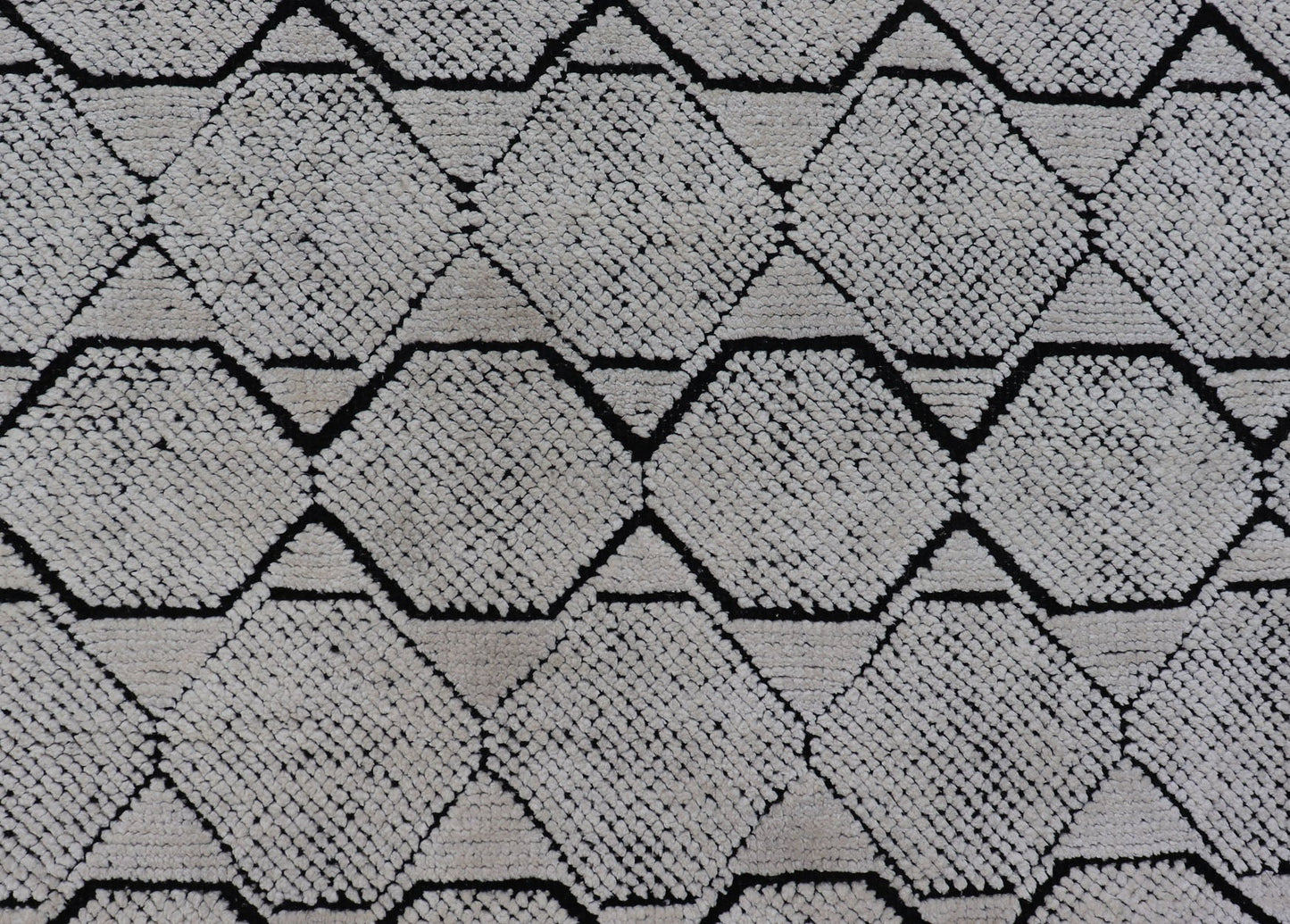 Indian Modern Geometric & Minimal Design Area Rug in Ivory and Black Measures 6'1 x 9'2 The design is a minimalistic, repeating pattern of octagons and triangles in black and ivory paneling the entire face horizontally. With a less - is - m... - Keivan Woven ArtsIN - ILM - 162 - 20988Rug