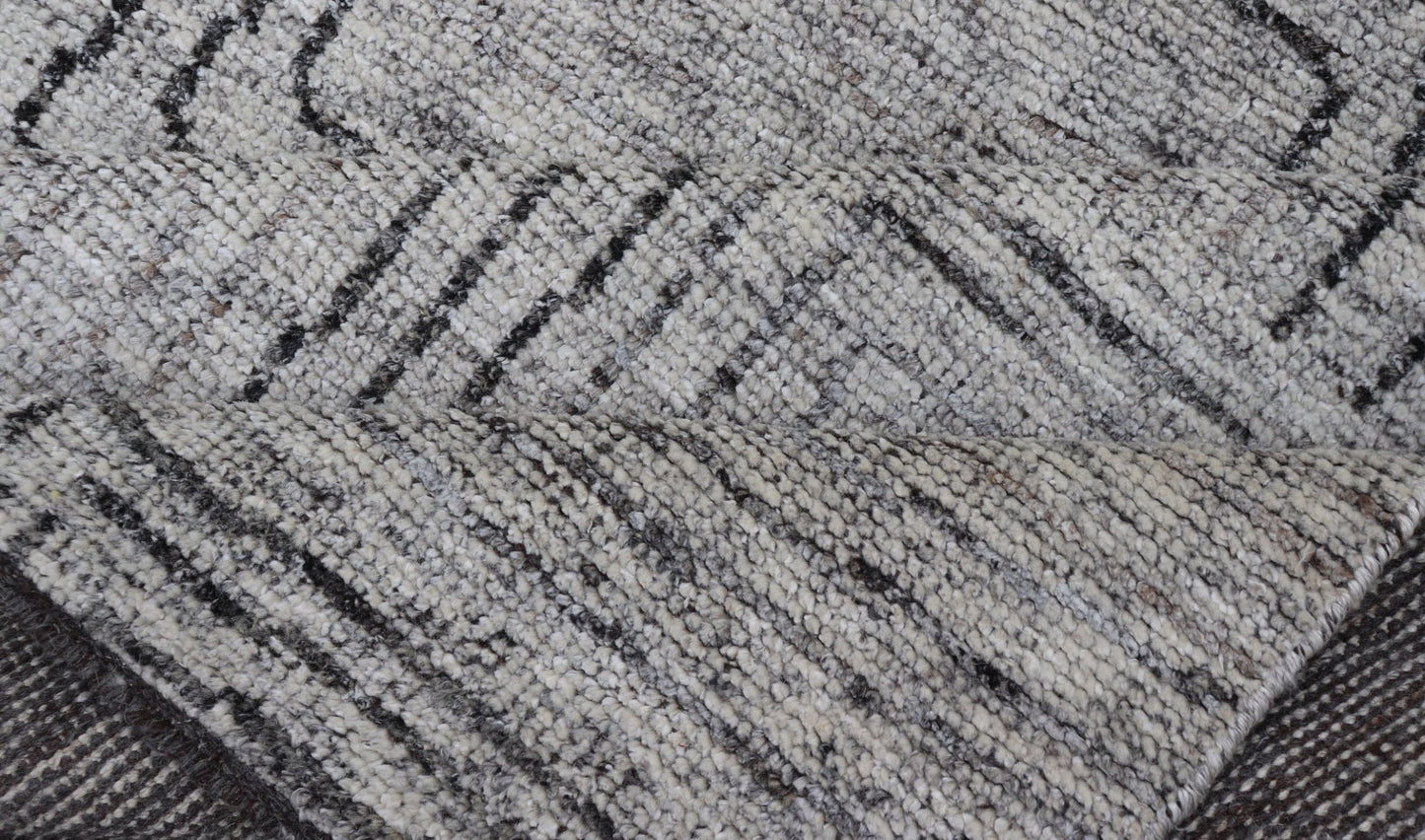 Indian Modern Hand Knotted Design With All Neutral Colored Wool Area Rug Measures 6 x 8'8 This modern area rug features varying shades of gray in the field, blending neutrals into a near - homogenous color. The simple design vines all - ove... - Keivan Woven ArtsIN - ILM - 167 - VT - 516 - 21096Rug