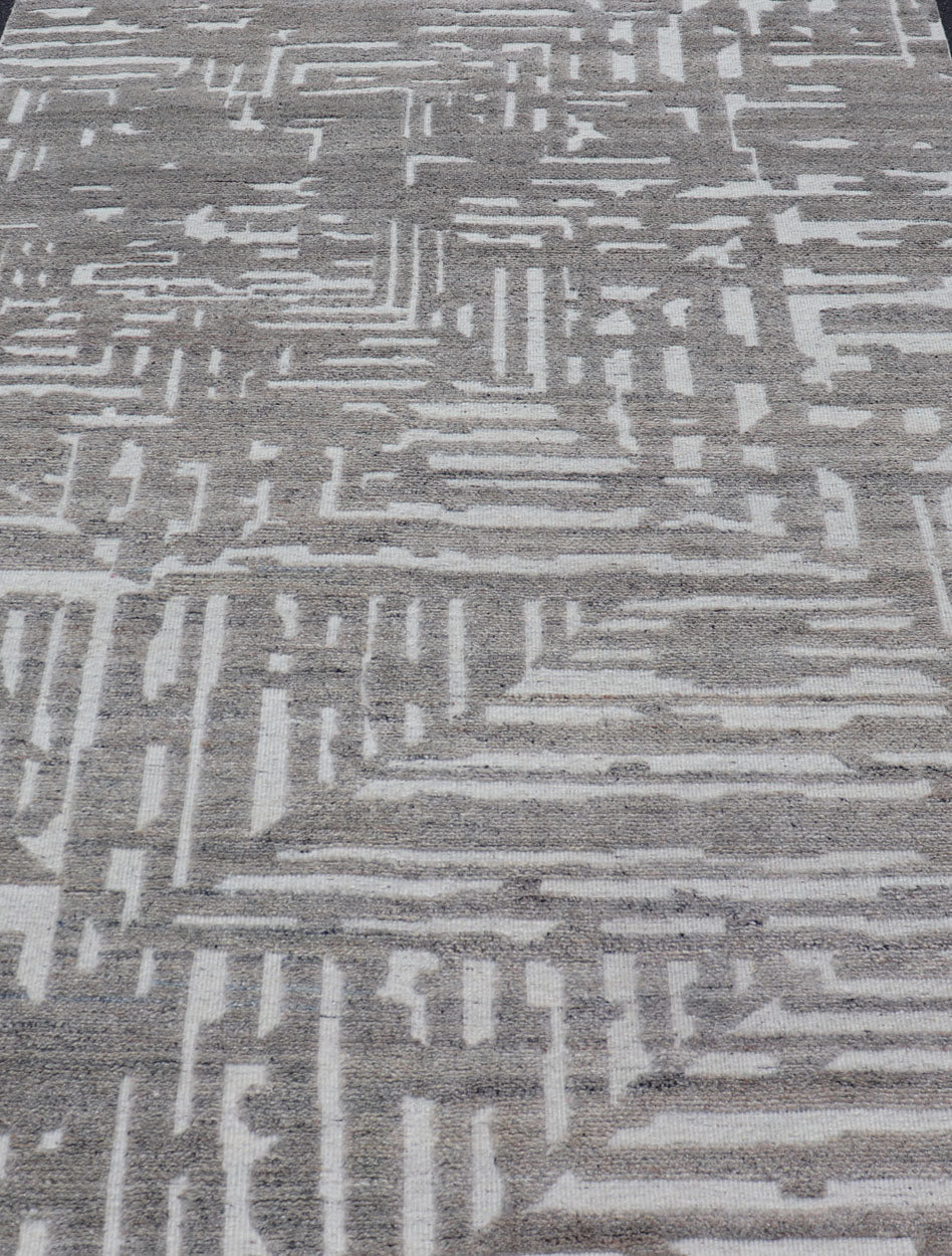 Modern Hand Knotted Wool Area Rug in Cream and Light Gray With Abstract Design Measures 5'8 x 8'5 This modern area rug was hand - knotted in during the 2020's. The field features a sub - geometric abstract design cover the entirety of the fa... - Keivan Woven ArtsIN - ILM - 172 - HW - 2330 - 21006Rug