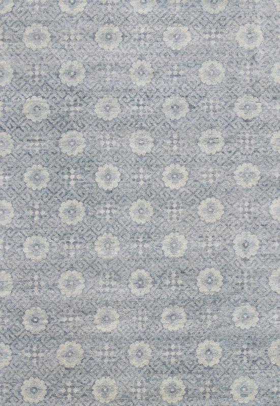Vintage Khotan Rug in White and Blue. Measures: 9'2 x 12'1. This superb woolen Khotan hailing from India features an all over design with geometric shapes and patterning enclosed within a complementary border. The rug is rendered in shades of whi... - Keivan Woven ArtsIN - JAI - 5385 - 6967Rug