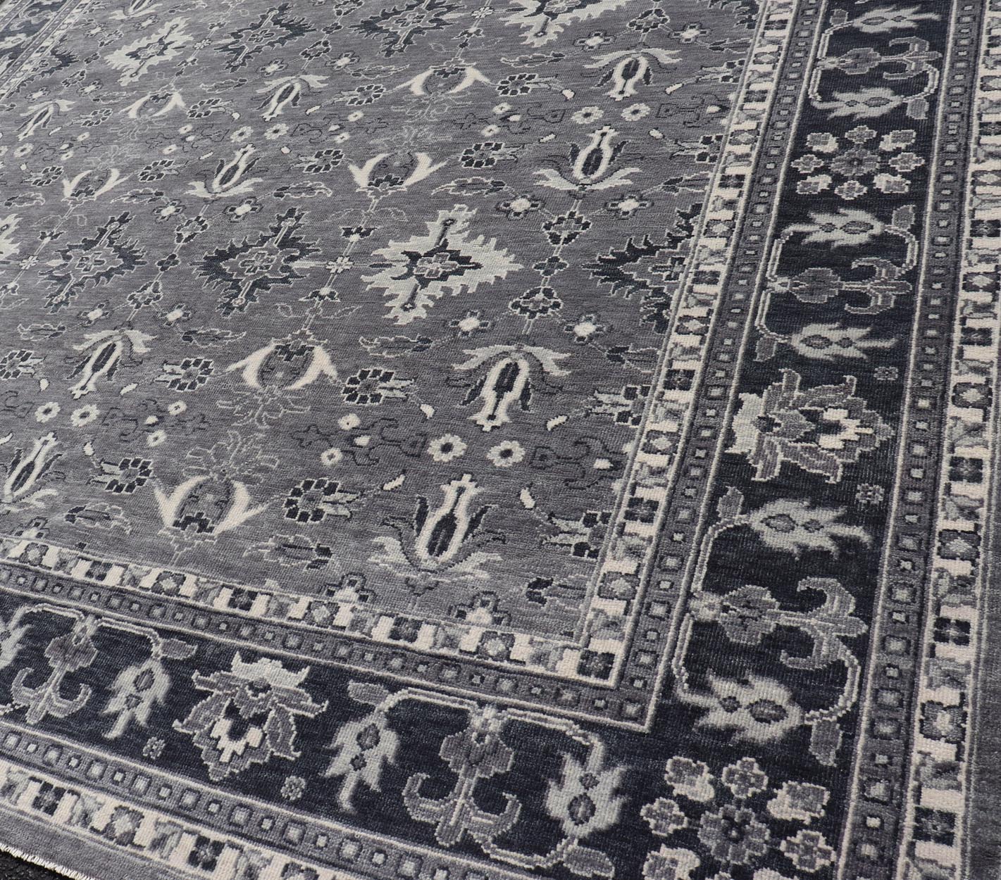 Floral Motif Khotan Area Rug by Keivan Woven Arts in Wool Measures 9'0 x 12'0 Country of Origin: India; Type: Khotan; Design: Floral, All - Over, Geometric Floral; Keivan Woven Arts; rug IN - TVN - 1457; Floral Motif Charcoal and Gray Muted Indian Kho... - Keivan Woven ArtsIN - TVN - 1457 - 15566Rug