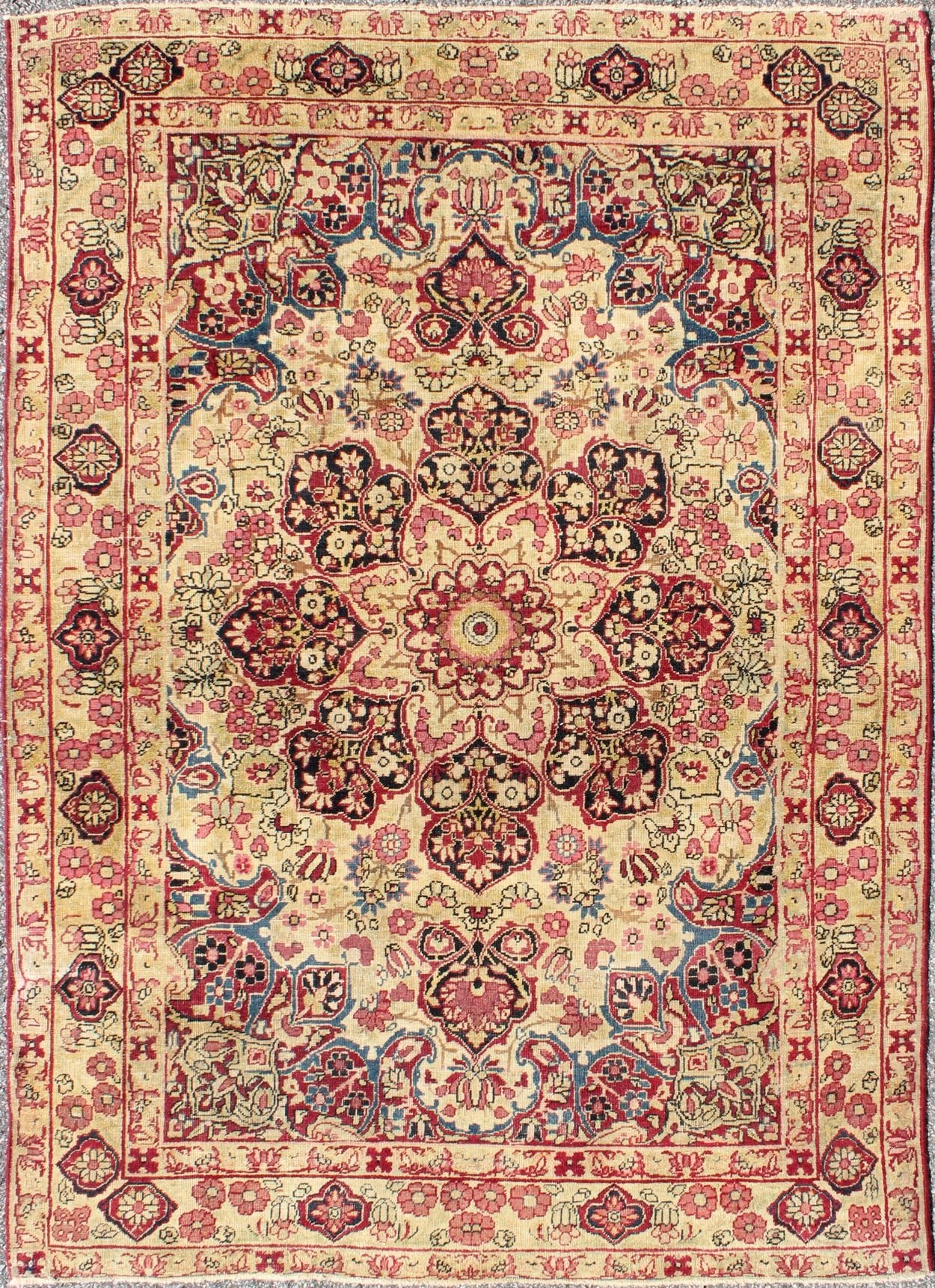Late 19th Century Antique Lavar - Kerman Rug with Red and Pink Floral Medallion, rug j10 - 1003, country of origin / type: Iran / Kerman, circa 1890 This antique Persian Lavar Kerman rug, circa 1890 from the late 19th century features an ivory field... - Keivan Woven ArtsJ10 - 1003 - 2491Rug