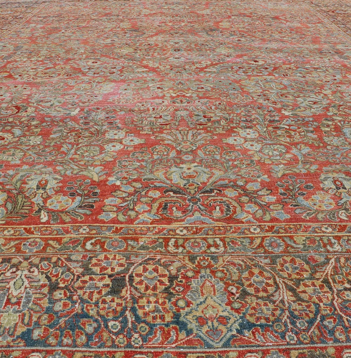 Antique Persian Sarouk withall - over floral design on a light red field. Keivan Woven Arts / J10 - 1101, country of origin / type: Iran / Sarouk circa 1920 Measures: 10'2 x 13'3 This wonderful early 20th century Persian Sarouk carpet features a mas... - Keivan Woven ArtsJ10 - 1101 - 2237Rug