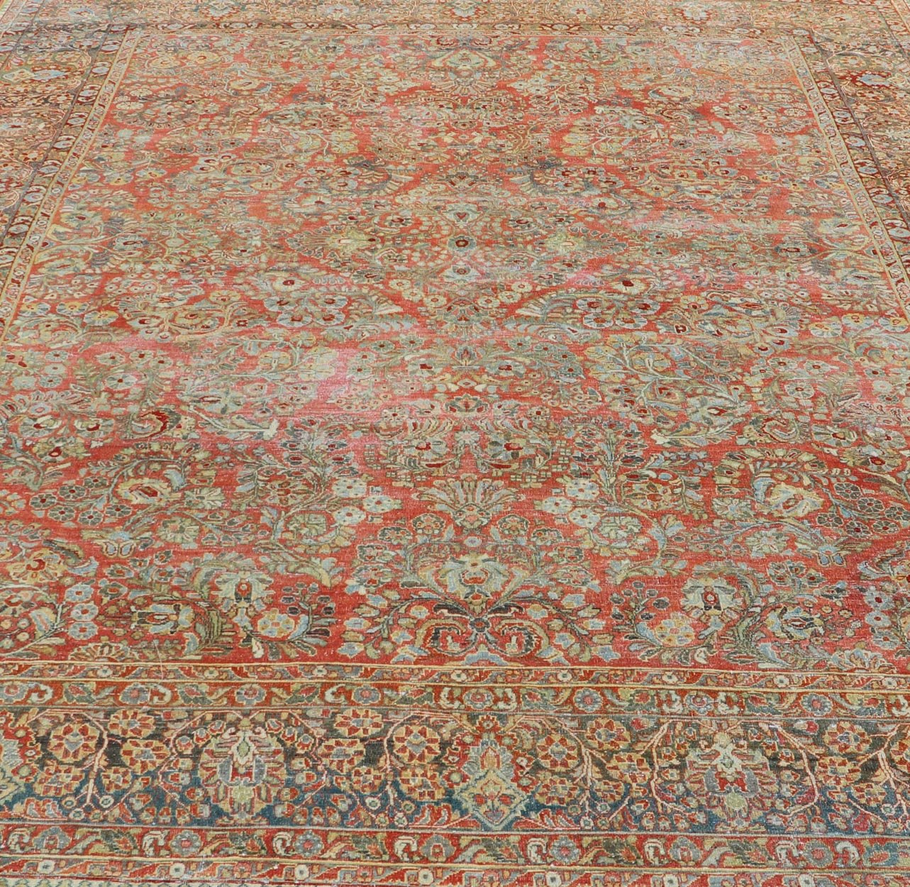Antique Persian Sarouk withall - over floral design on a light red field. Keivan Woven Arts / J10 - 1101, country of origin / type: Iran / Sarouk circa 1920 Measures: 10'2 x 13'3 This wonderful early 20th century Persian Sarouk carpet features a mas... - Keivan Woven ArtsJ10 - 1101 - 2237Rug