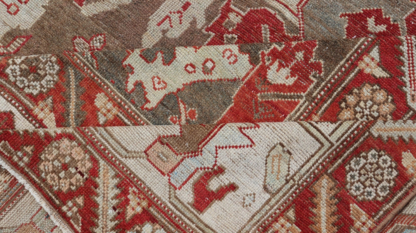 Antique Persian Large Scale Tribal Design Bakhtiari Rug in Multi Colors. All - over tribal large scale design antique Persian Bakhtiari rug in red, blue, green, ivory and pink. Keivan Woven Arts / rug KB - NA - 180427, country of origin / type: Iran / Bakhti... - Keivan Woven ArtsKB - NA - 180427 - 20854Rug