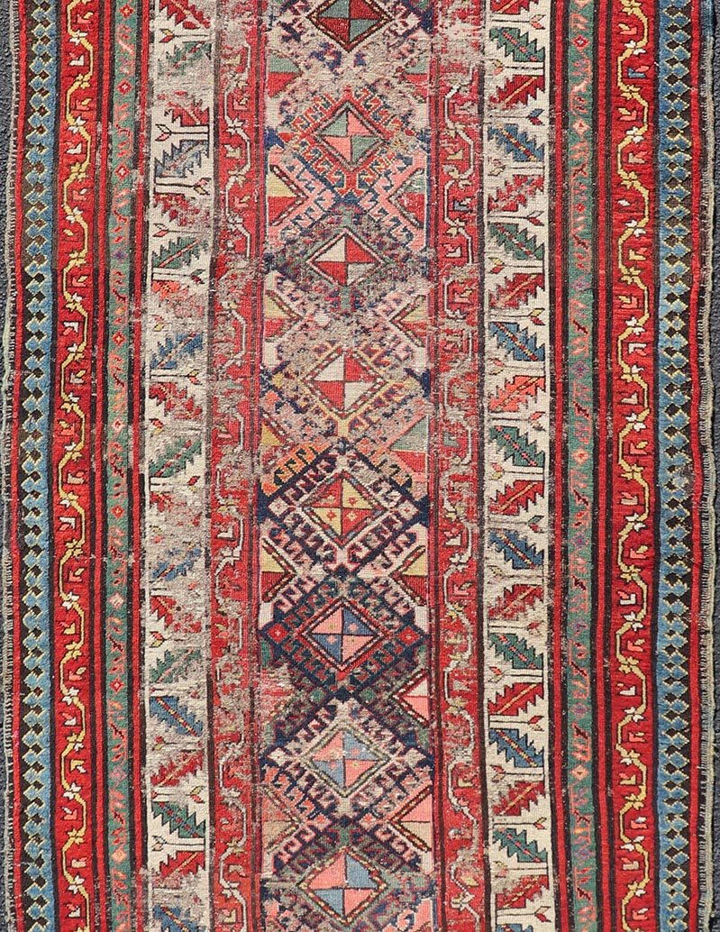 Distressed Medallion Antique Caucasian Kazak Rug with Geometric Medallions Distressed Geometric Medallion antique Caucasian Kazak rug in lighter tones. Keivan Woven Arts / rug KBE - 220101, country of origin / type: Iran / Caucasian Kazak, circa 1... - Keivan Woven ArtsKBE - 220101 - 19088