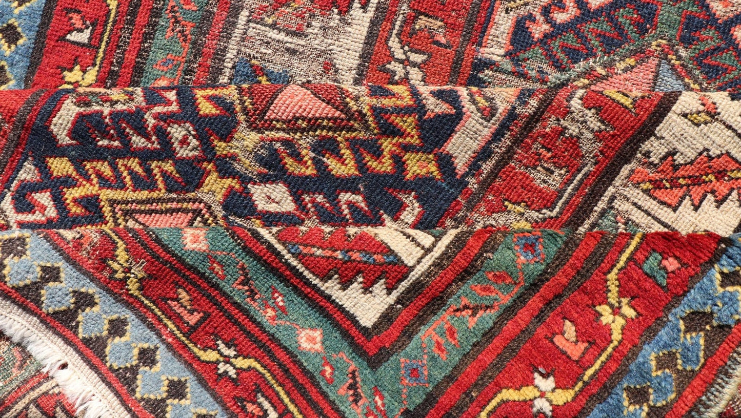Distressed Medallion Antique Caucasian Kazak Rug with Geometric Medallions Distressed Geometric Medallion antique Caucasian Kazak rug in lighter tones. Keivan Woven Arts / rug KBE - 220101, country of origin / type: Iran / Caucasian Kazak, circa 1... - Keivan Woven ArtsKBE - 220101 - 19088