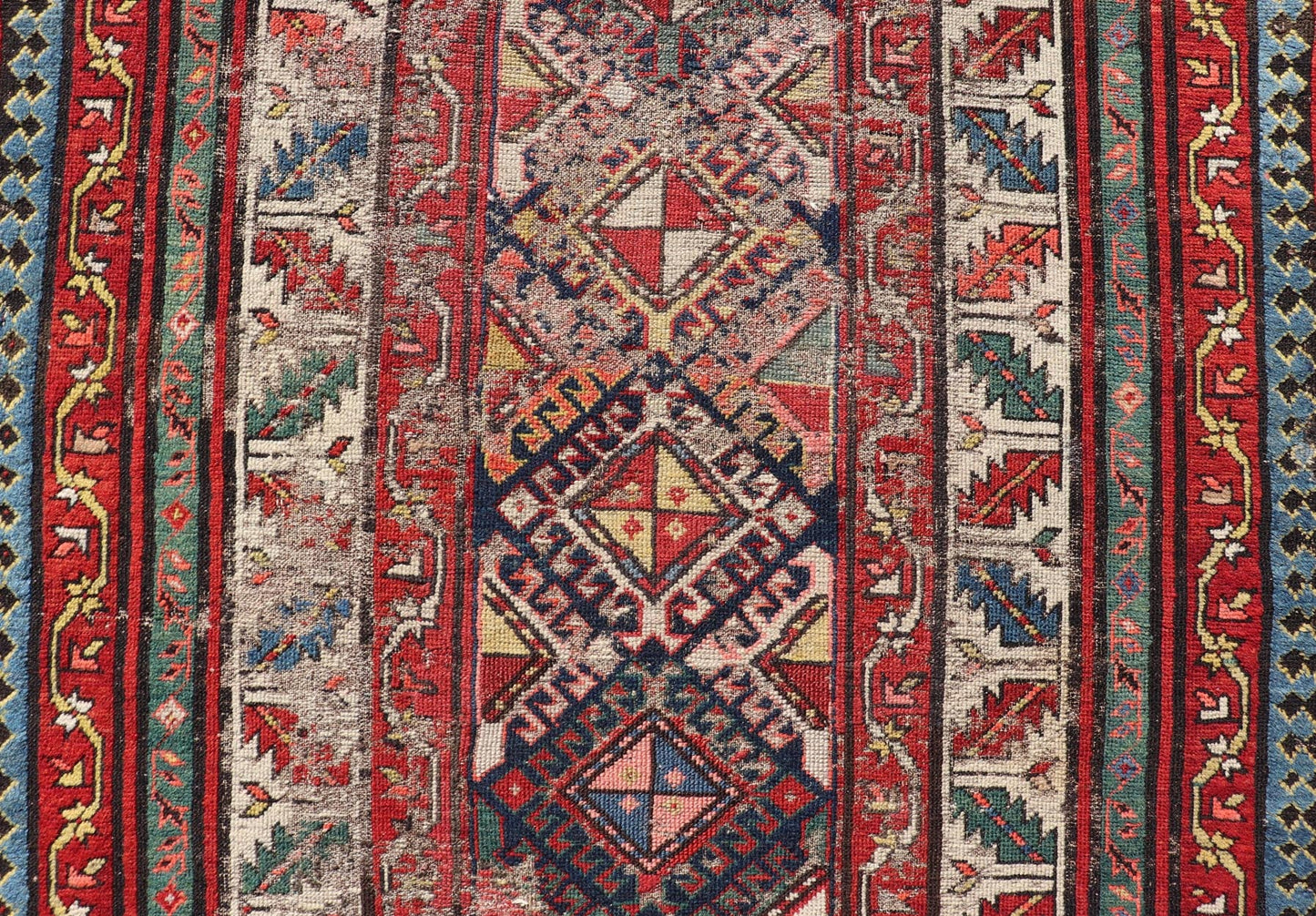 Distressed Medallion Antique Caucasian Kazak Rug with Geometric Medallions Distressed Geometric Medallion antique Caucasian Kazak rug in lighter tones. Keivan Woven Arts / rug KBE - 220101, country of origin / type: Iran / Caucasian Kazak, circa 1... - Keivan Woven ArtsKBE - 220101 - 19088
