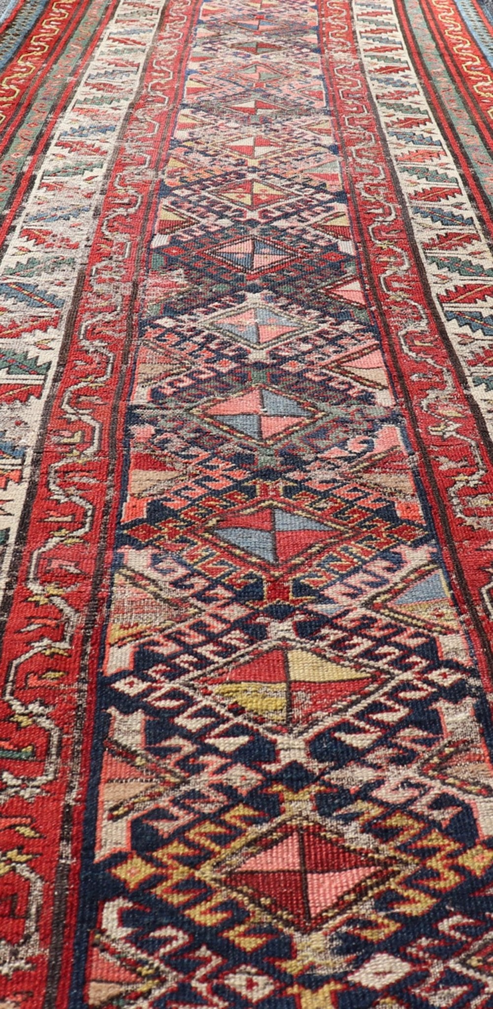 Distressed Medallion Antique Caucasian Kazak Rug with Geometric Medallions Distressed Geometric Medallion antique Caucasian Kazak rug in lighter tones. Keivan Woven Arts / rug KBE - 220101, country of origin / type: Iran / Caucasian Kazak, circa 1... - Keivan Woven ArtsKBE - 220101 - 19088