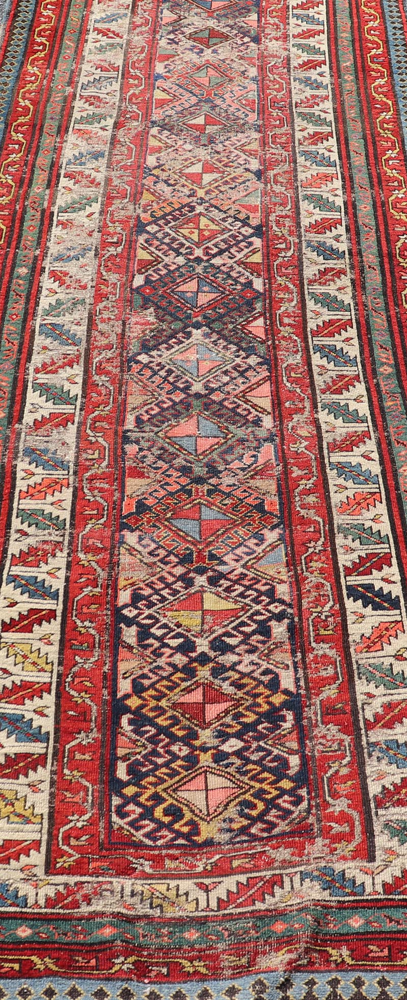 Distressed Medallion Antique Caucasian Kazak Rug with Geometric Medallions Distressed Geometric Medallion antique Caucasian Kazak rug in lighter tones. Keivan Woven Arts / rug KBE - 220101, country of origin / type: Iran / Caucasian Kazak, circa 1... - Keivan Woven ArtsKBE - 220101 - 19088