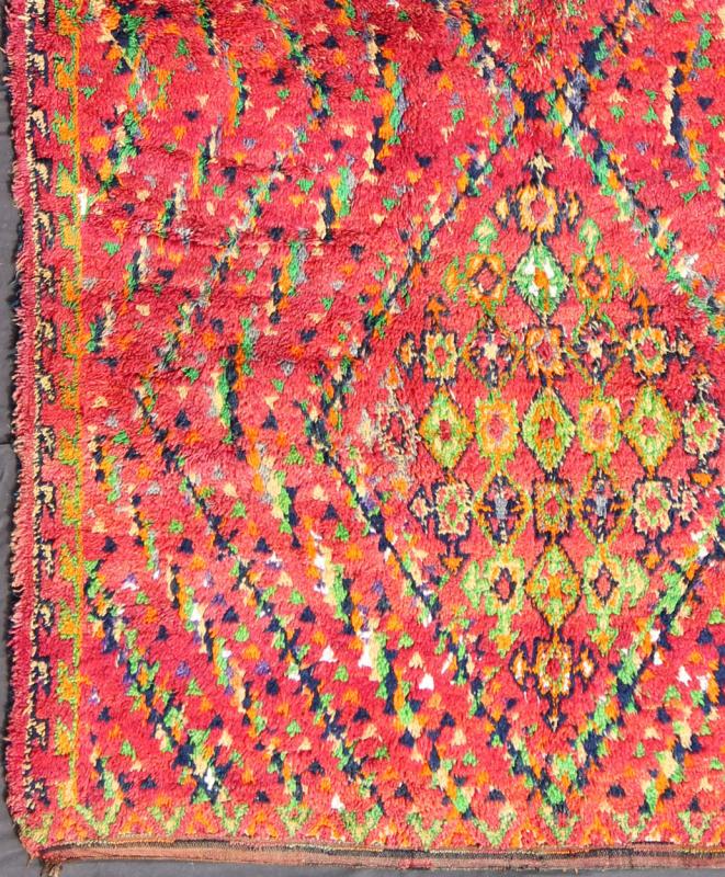 Mid - Century Tribal Moroccan Vintage Rug with Colorful, Vibrant Diamond Pattern Measures: 6'8'' x 10'6''. This Moroccan rug has a vibrant all - over diamond geometric pattern with navy blue outlines, set on a field shaded with orange and red. Th... - Keivan Woven ArtsKBE - LCB - 136650 - 7345Rug