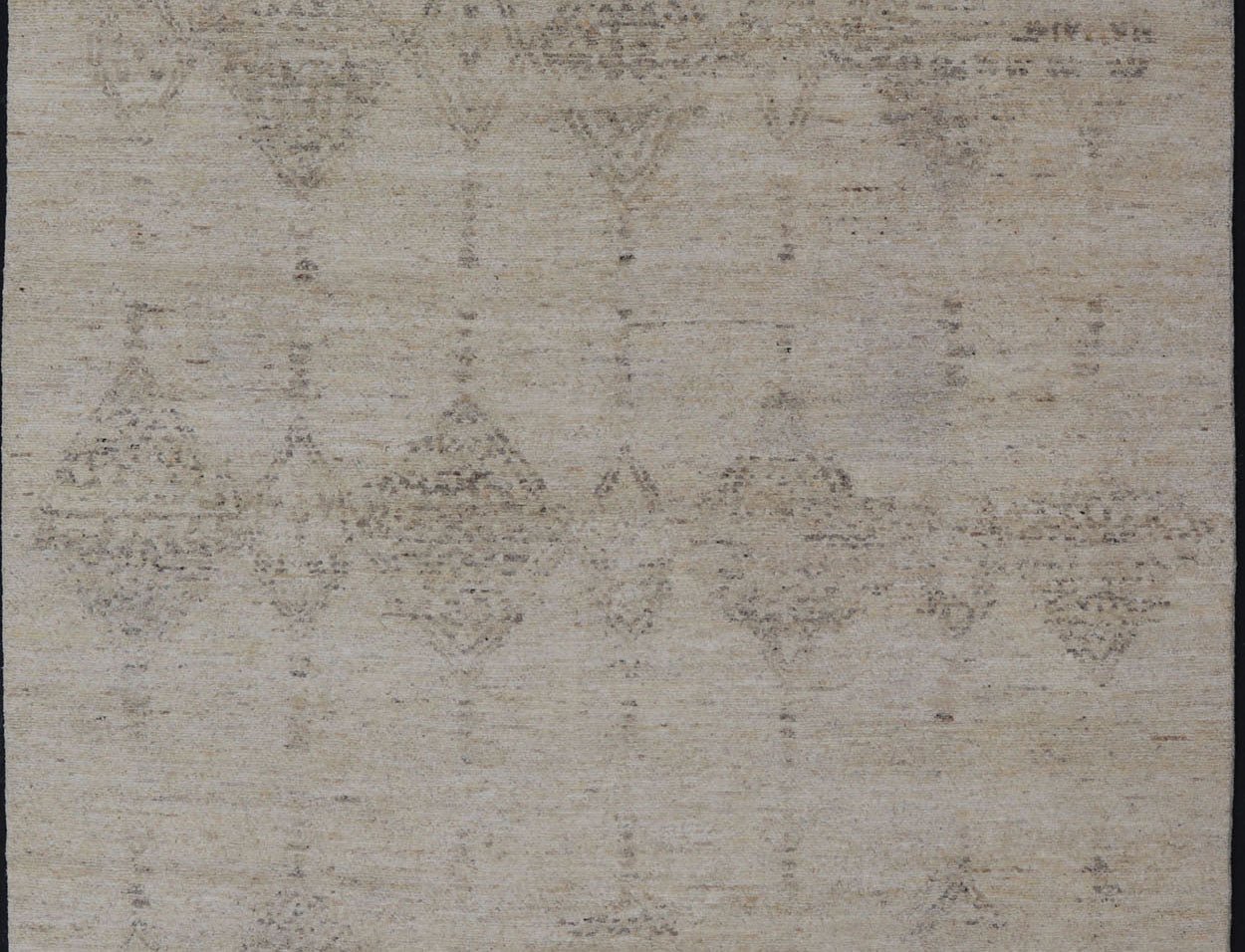 Moroccan Styled Diamond Design on All - Beige Modern Area Rug Measures 13'0 x 17'8 This modern rugs field is rendered in a blend of cream and beige, while the design is a gray. The vertical diamonds loosely resemble that of Moroccan triba... - Keivan Woven ArtsKHN - 34906 - TR - 1057 - 21024Rug