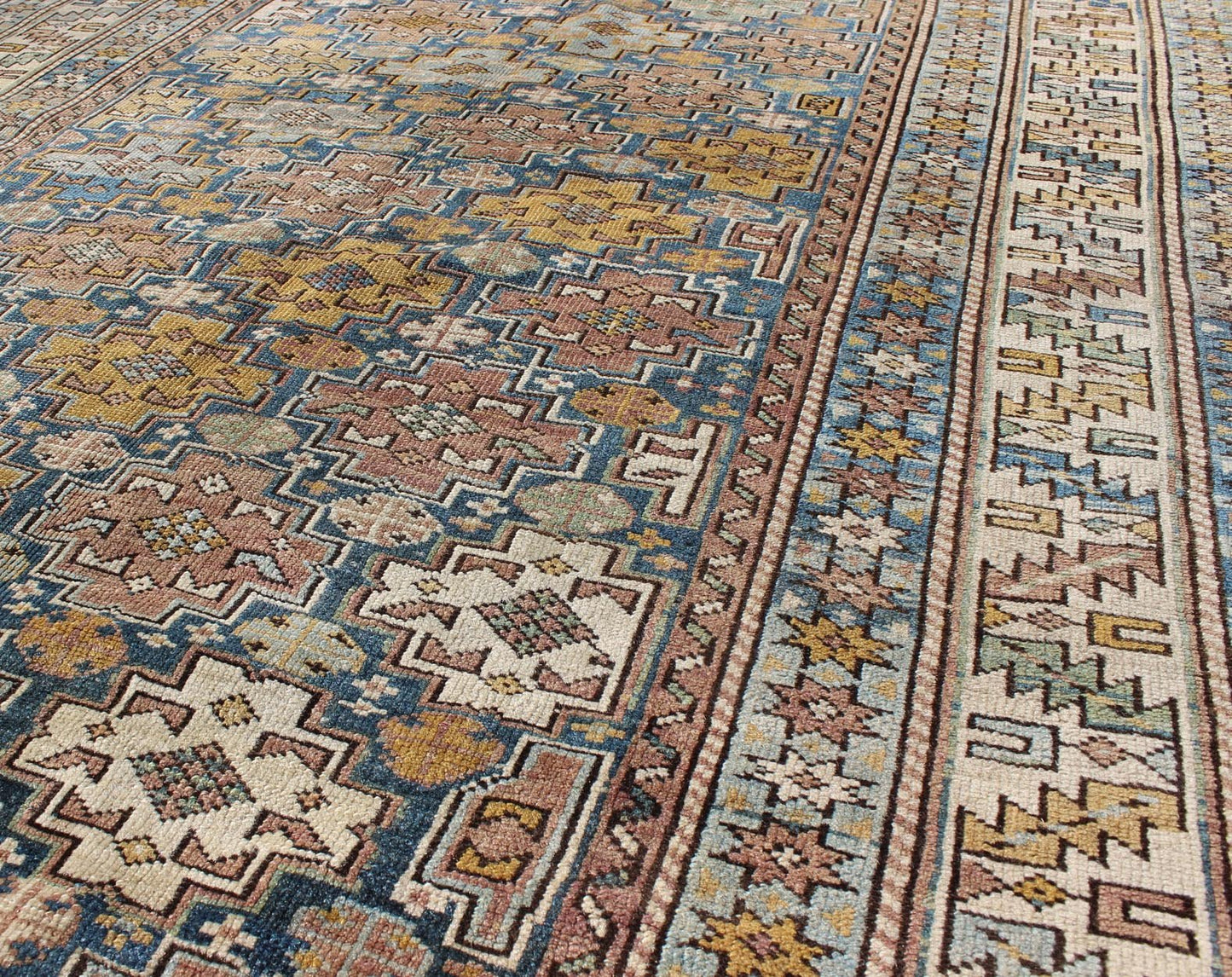 1900's Antique Shirvan Rug with All - Over, Blossoming Cross - Shaped Motifs, rug l11 - 0909, country of origin / type: Caucasus / Shirvan, circa 1880 This colorful blossom carpet (circa 1880) from Shirvan features an all - over pattern woven with a wel... - Keivan Woven ArtsL11 - 0909 - 2952Rug