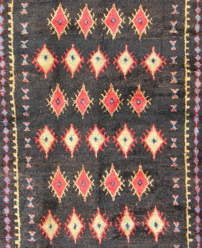 Charcoal Black Background Unique Vintage Moroccan Rug in Red and Yellow Measures: 4'9'' x 9'10''. Featuring a central charcoal field full of red and yellow diamond - shaped motifs, this unique Moroccan rug displays a harmonious and rich color p... - Keivan Woven ArtsLCB - 136610 - 7321Rug
