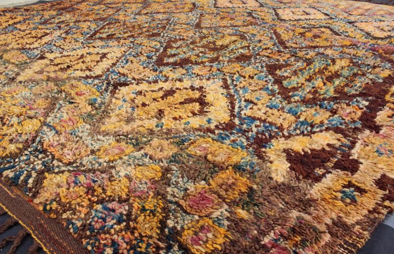 Vintage Square Moroccan Beni Ouarain In Earthy Tones With Pops of Blue and Gold Measures: 7'9'' x 8'4''. This piece is a thick and lush vintage tribal Moroccan carpet which originated from the northern Middle Atlas mountains. The weavers of t... - Keivan Woven ArtsLCB - 136638 - 7329Rug