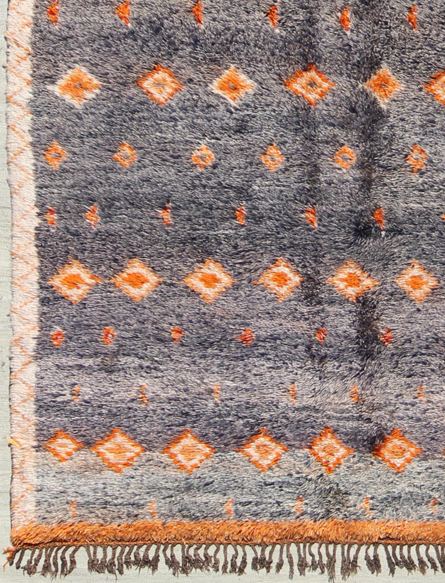 Charcoal and Orange Vintage Moroccan Rug with Geometric Design Moroccan Vintage Rug with Orange Geometric Design Rendered on a Variegated Charcoal Field, rug lcb - 18 - 79, country of origin / type: Morocco / Tribal, circa 1940. Crafted in t... - Keivan Woven ArtsLCB - 18 - 79 - 9587Rug